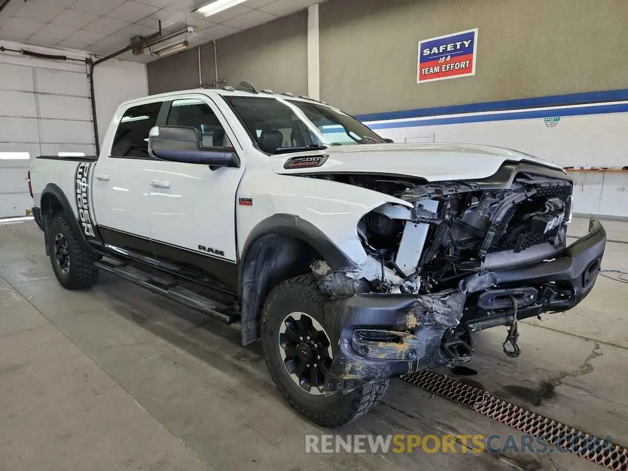 4 Photograph of a damaged car 3C6TR5EJ5LG126296 RAM 2500 2020