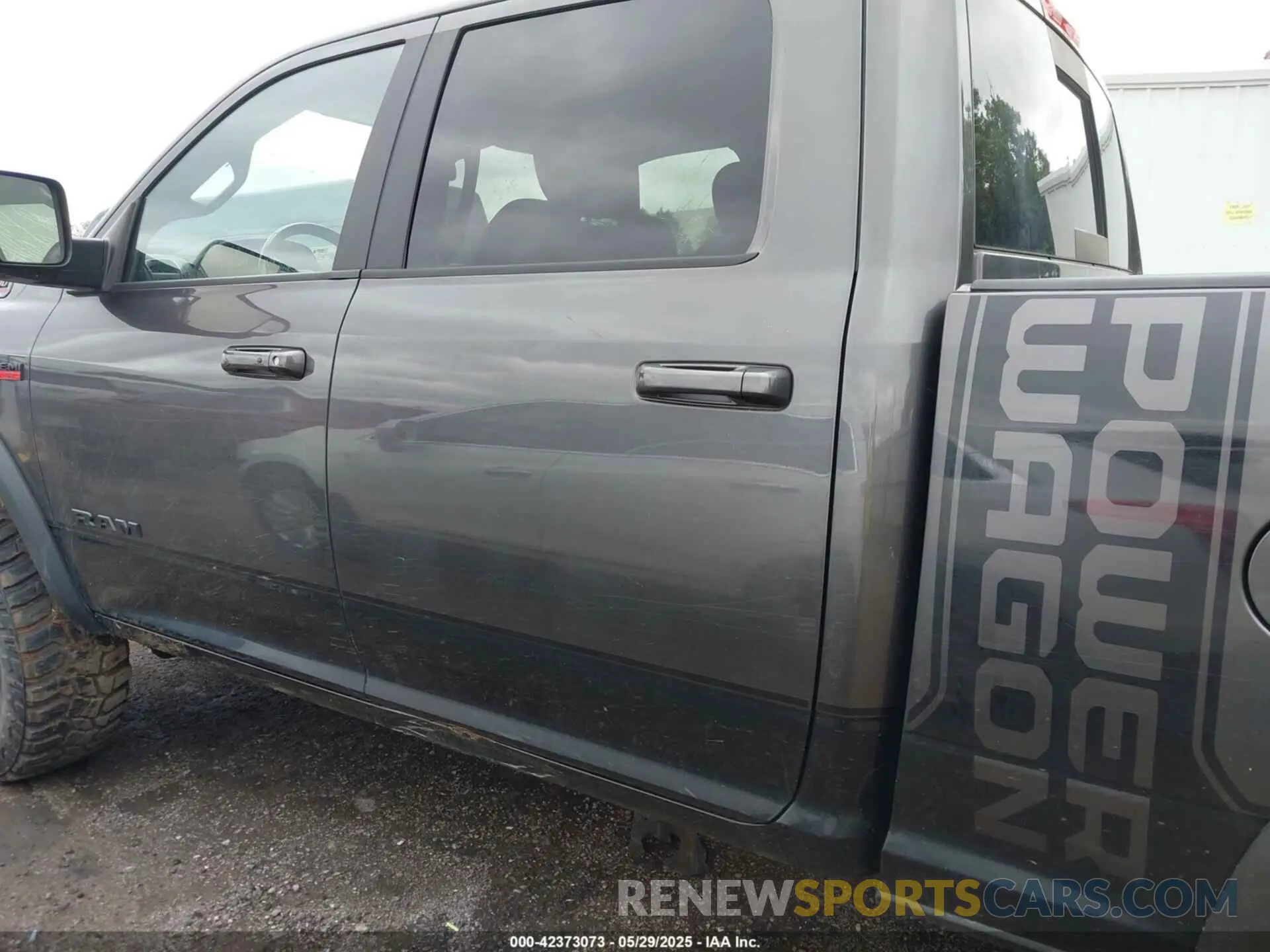 14 Photograph of a damaged car 3C6TR5EJ6LG303485 RAM 2500 2020