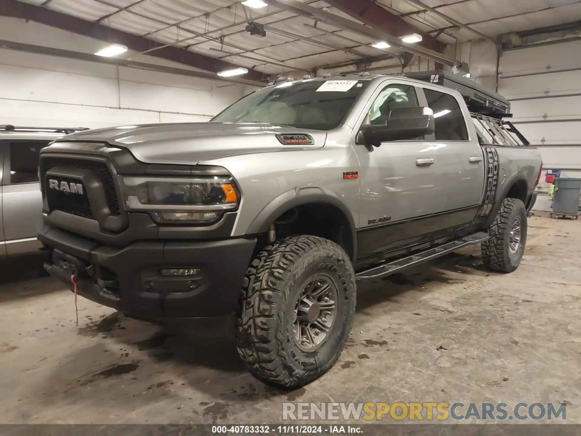 2 Photograph of a damaged car 3C6TR5EJ9LG163156 RAM 2500 2020