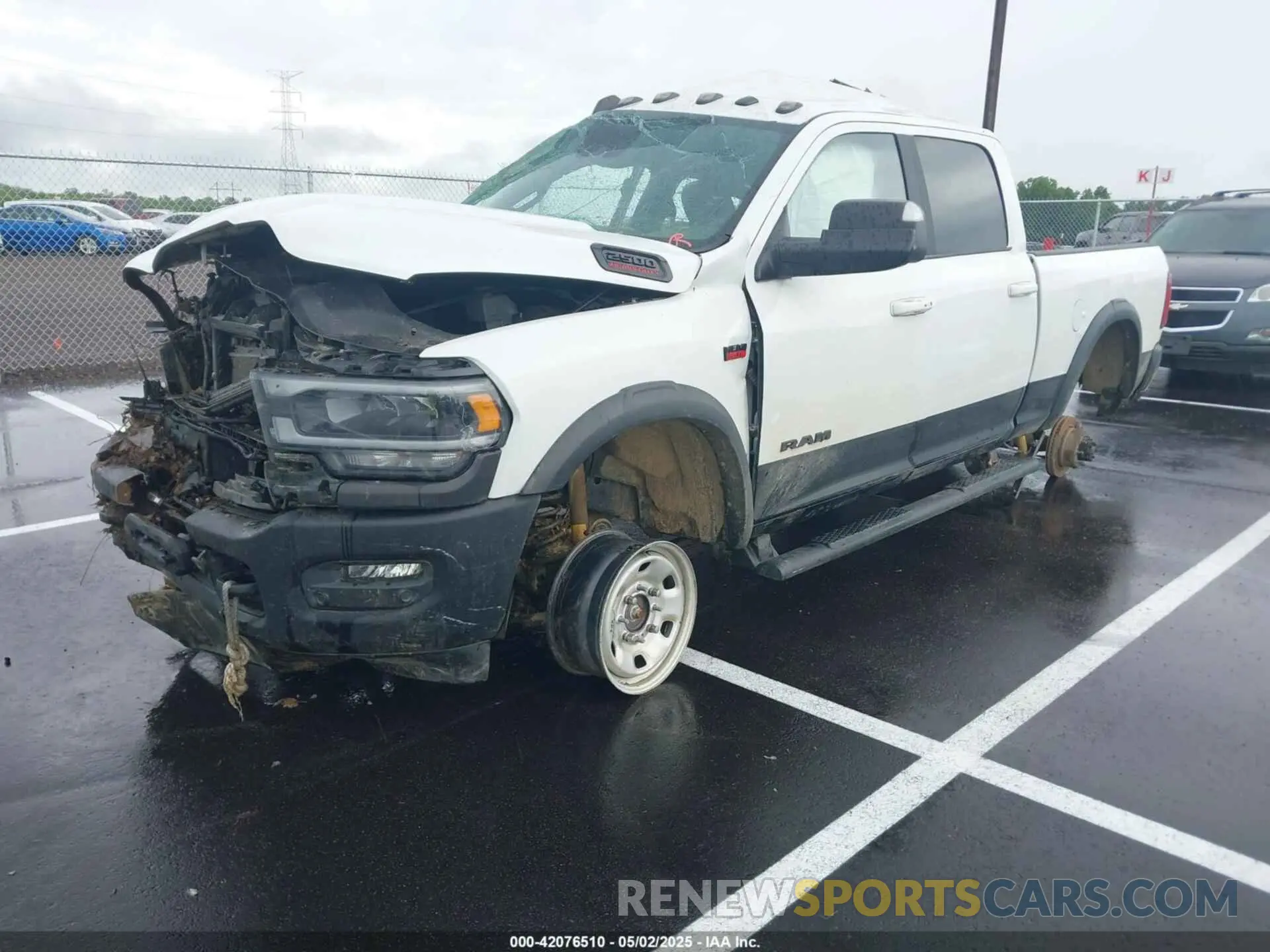 2 Photograph of a damaged car 3C6TR5EJ9LG303402 RAM 2500 2020