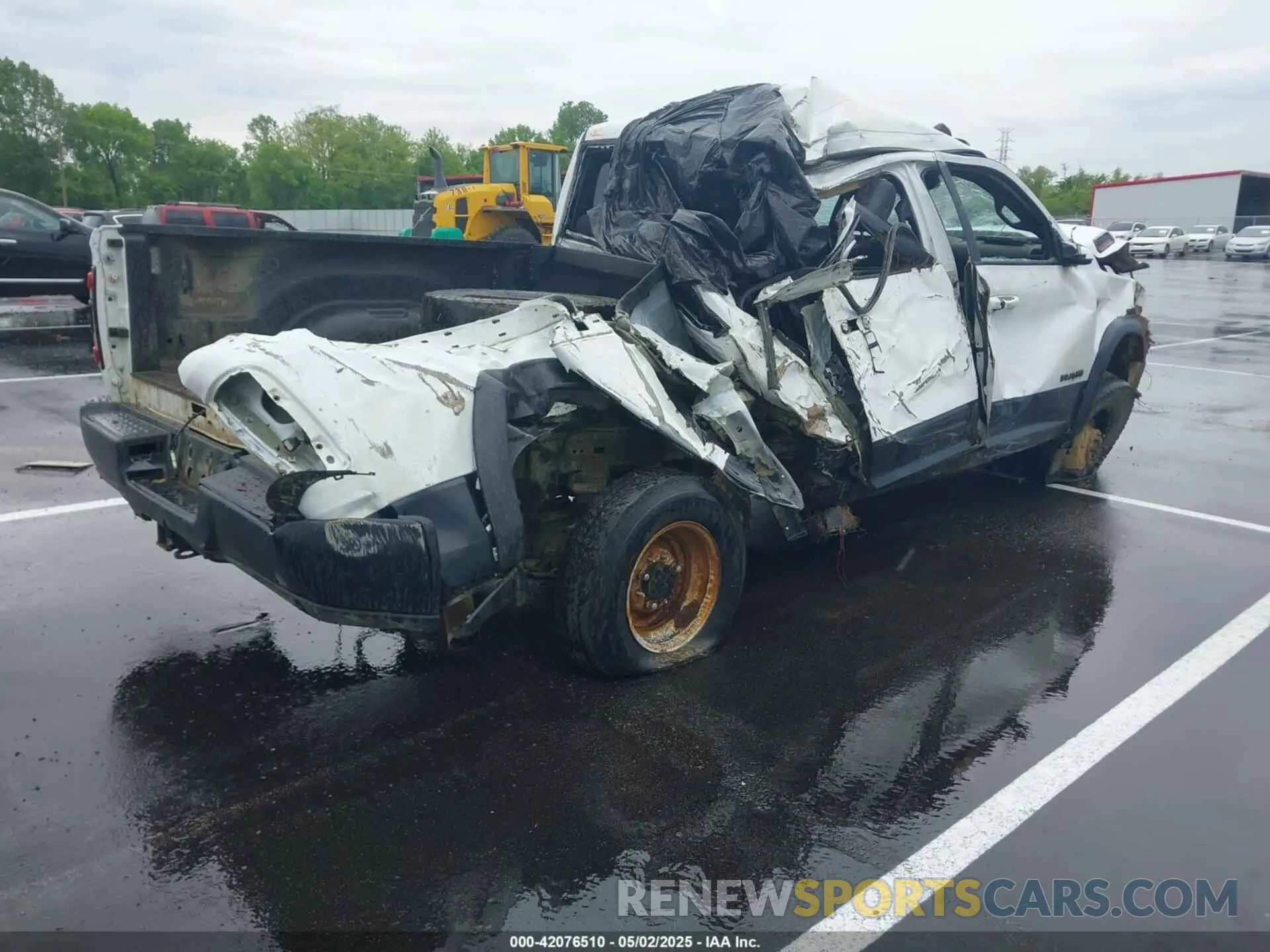4 Photograph of a damaged car 3C6TR5EJ9LG303402 RAM 2500 2020