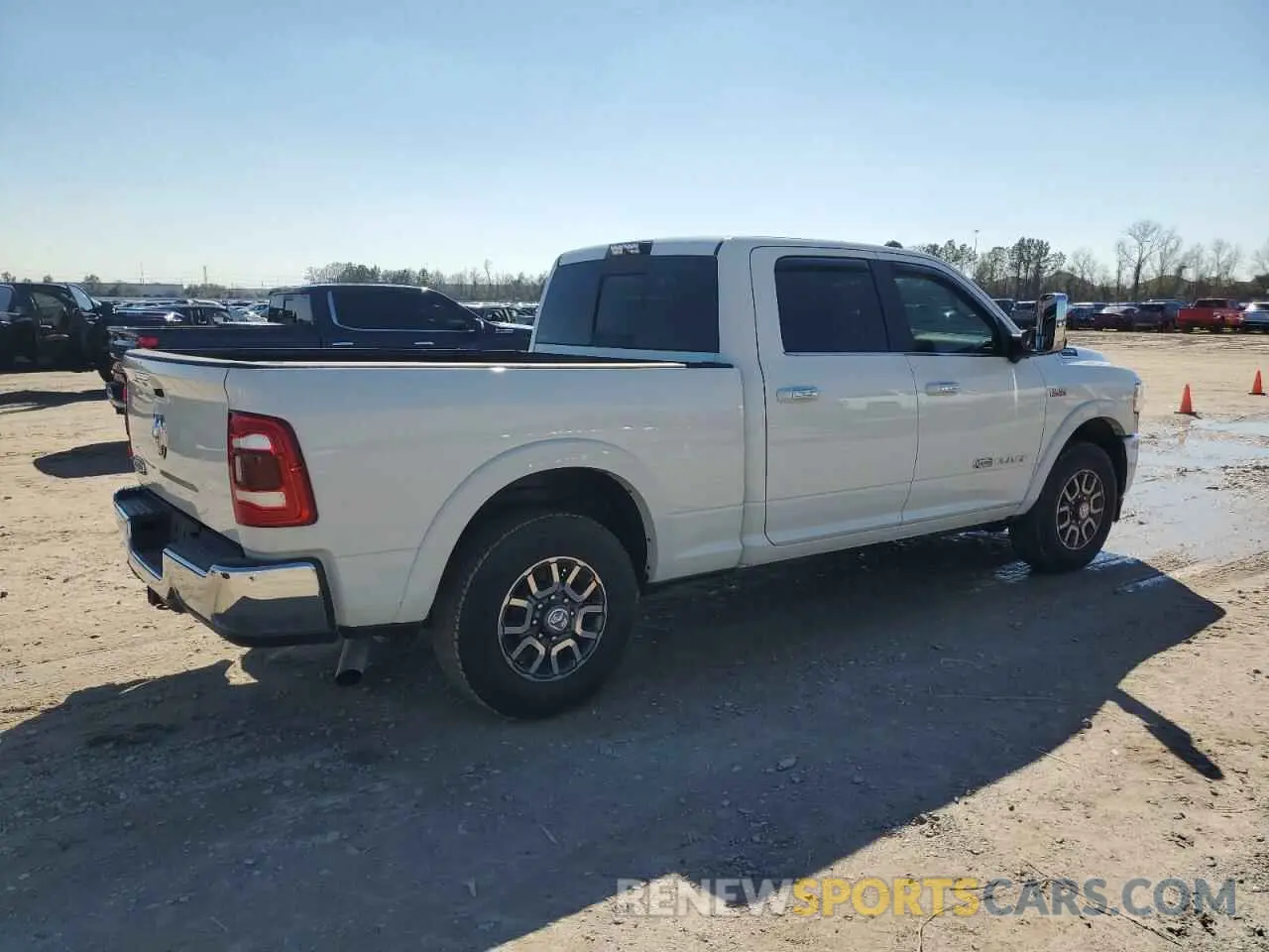 3 Photograph of a damaged car 3C6UR4GJ2LG109452 RAM 2500 2020
