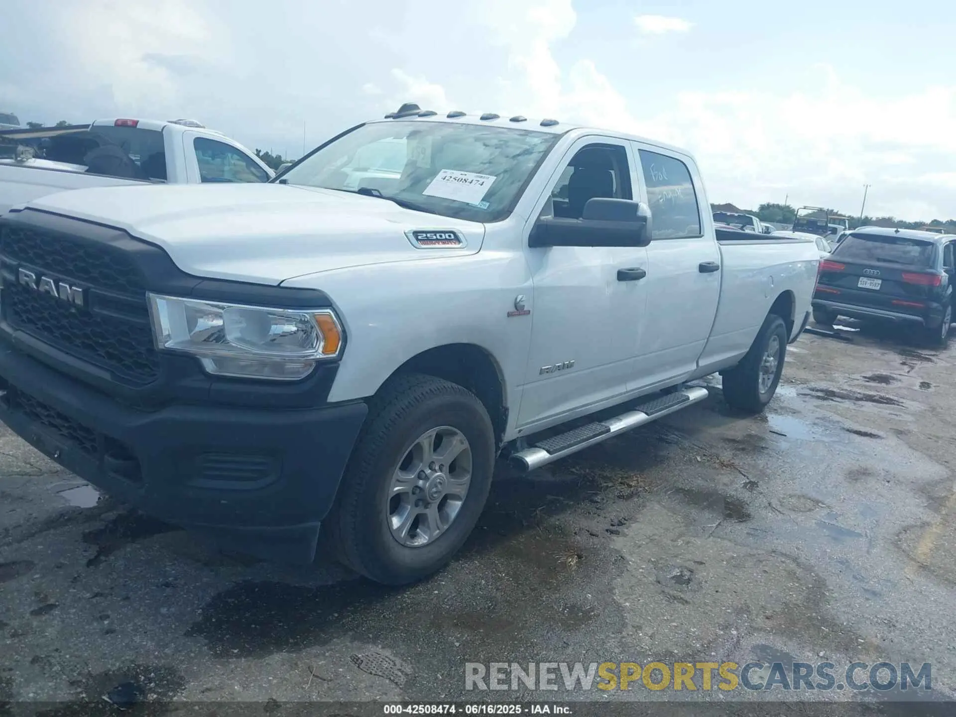 2 Photograph of a damaged car 3C6UR4HL4LG266478 RAM 2500 2020