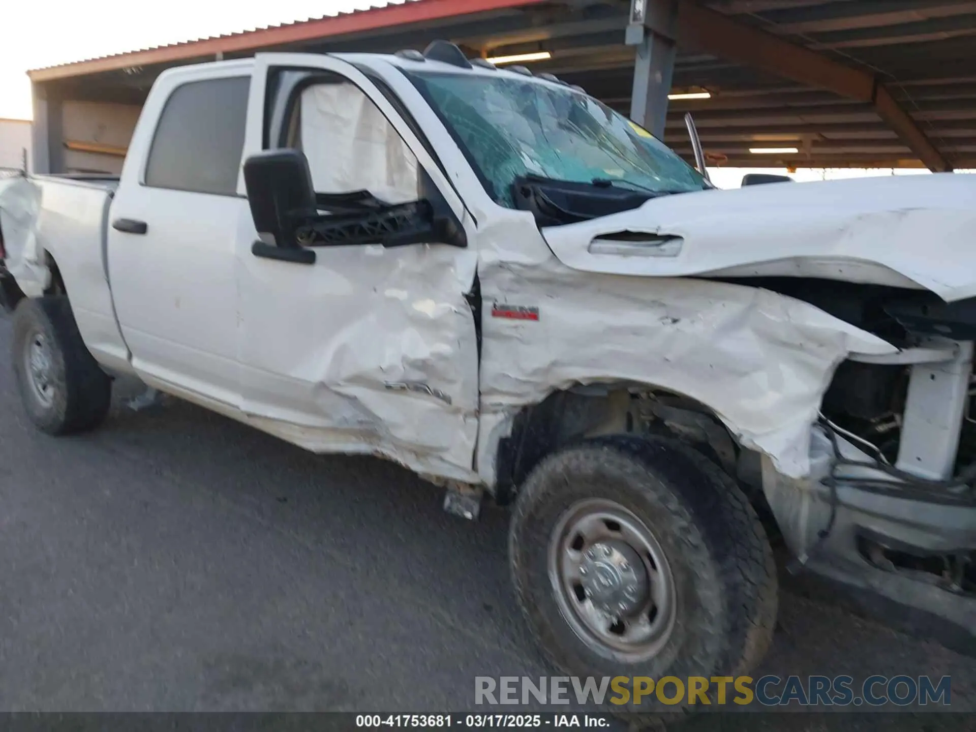 6 Photograph of a damaged car 3C6UR5CJ0LG250404 RAM 2500 2020