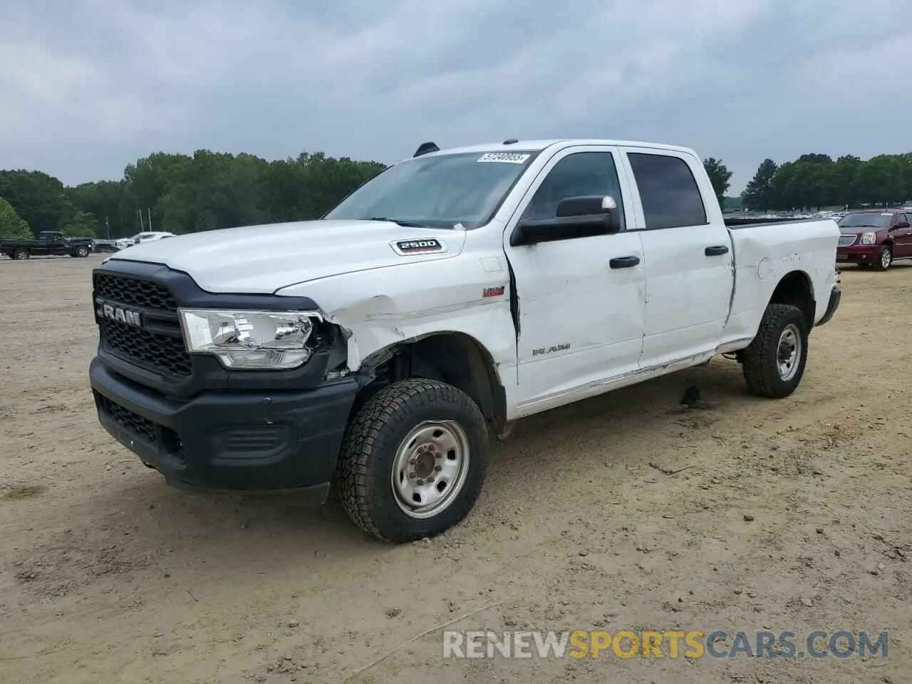 1 Photograph of a damaged car 3C6UR5CJ1LG112161 RAM 2500 2020