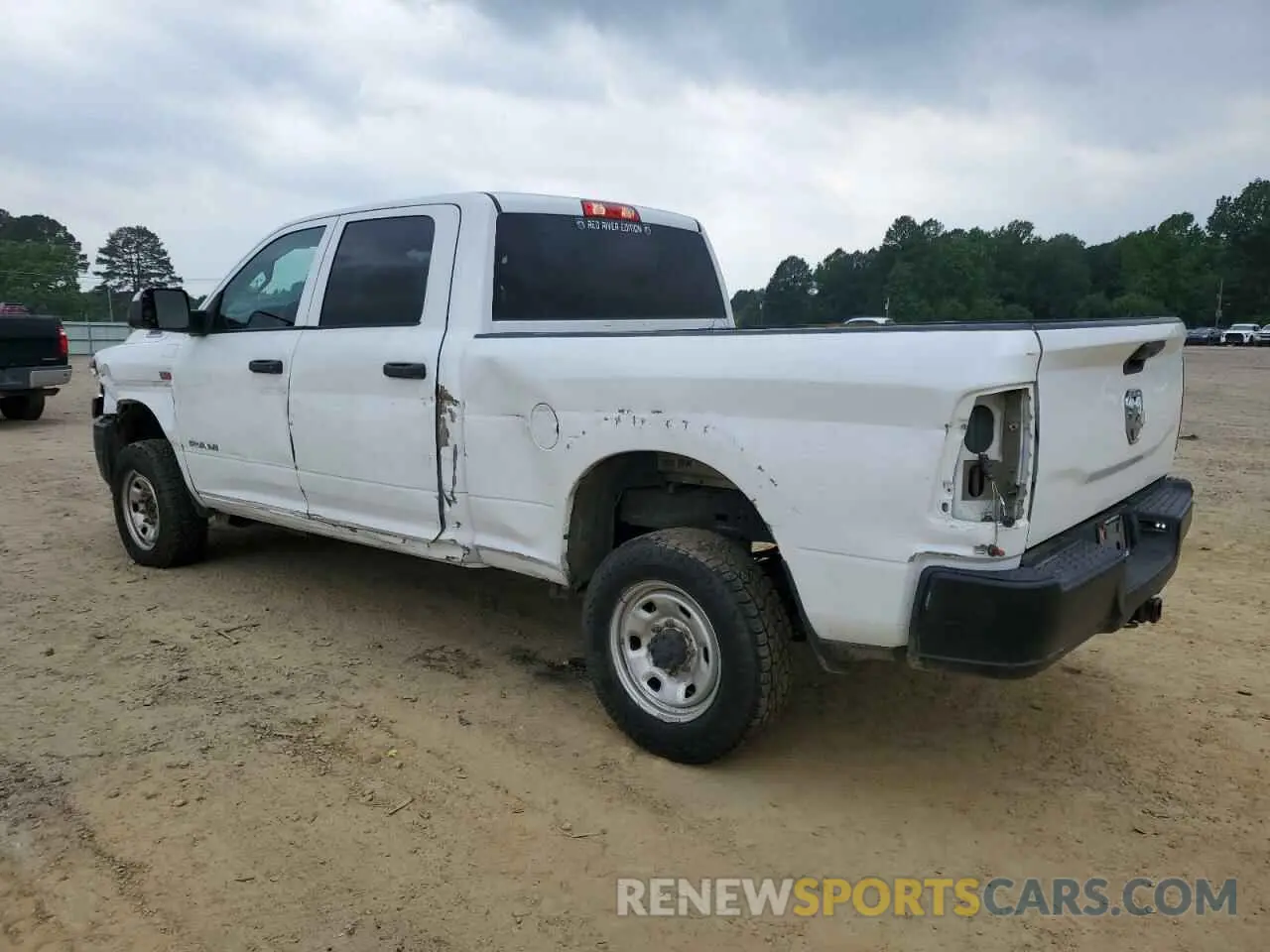 2 Photograph of a damaged car 3C6UR5CJ1LG112161 RAM 2500 2020