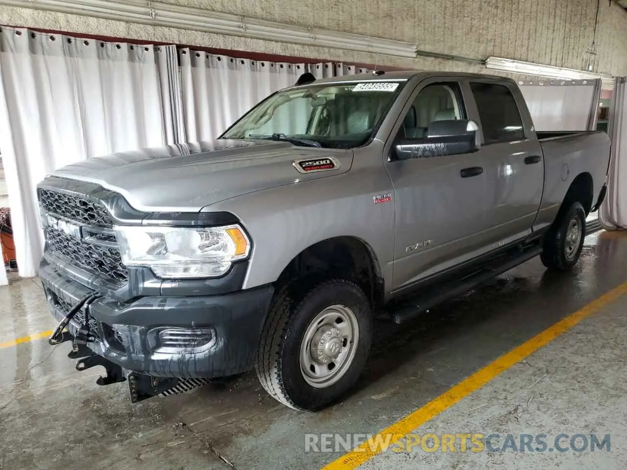 1 Photograph of a damaged car 3C6UR5CJ1LG136332 RAM 2500 2020
