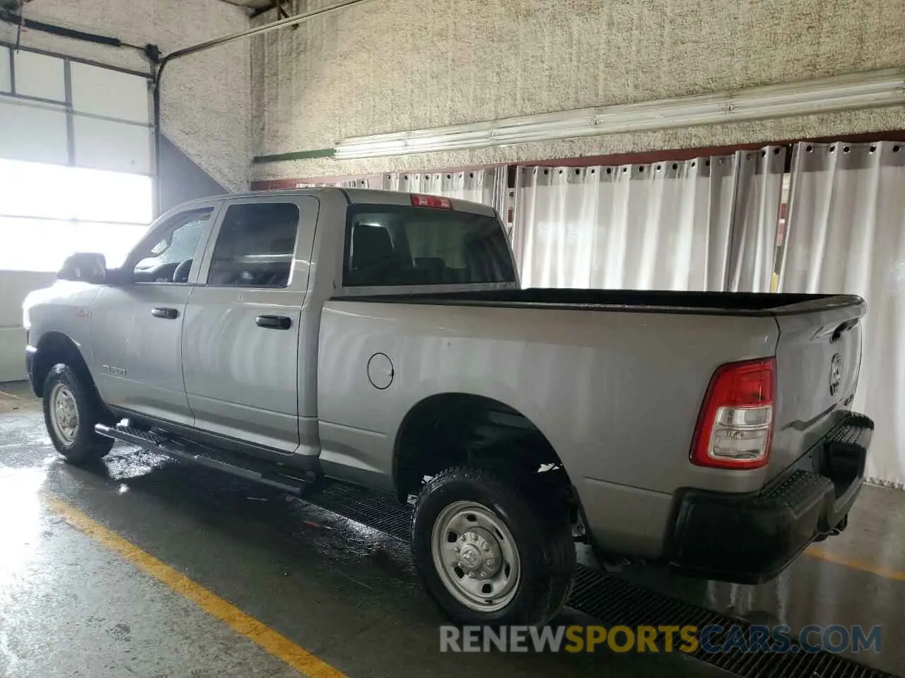 2 Photograph of a damaged car 3C6UR5CJ1LG136332 RAM 2500 2020