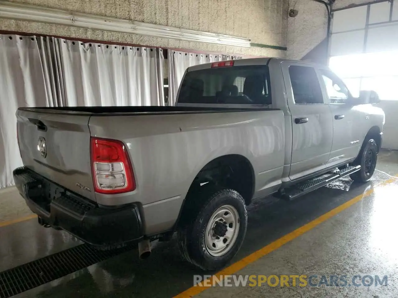 3 Photograph of a damaged car 3C6UR5CJ1LG136332 RAM 2500 2020