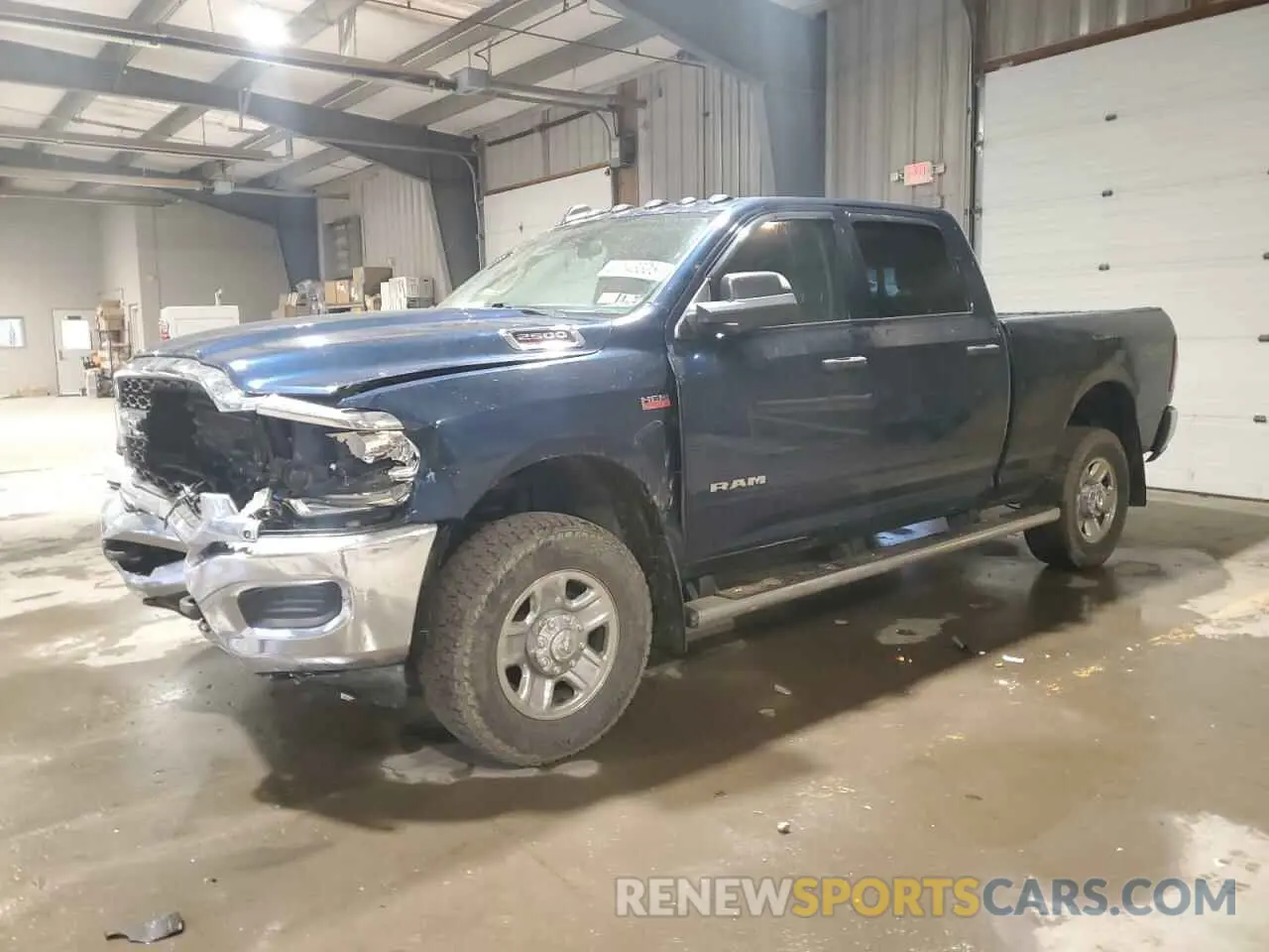 1 Photograph of a damaged car 3C6UR5CJ6LG256594 RAM 2500 2020