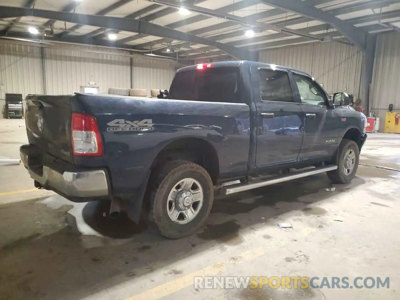 3 Photograph of a damaged car 3C6UR5CJ6LG256594 RAM 2500 2020