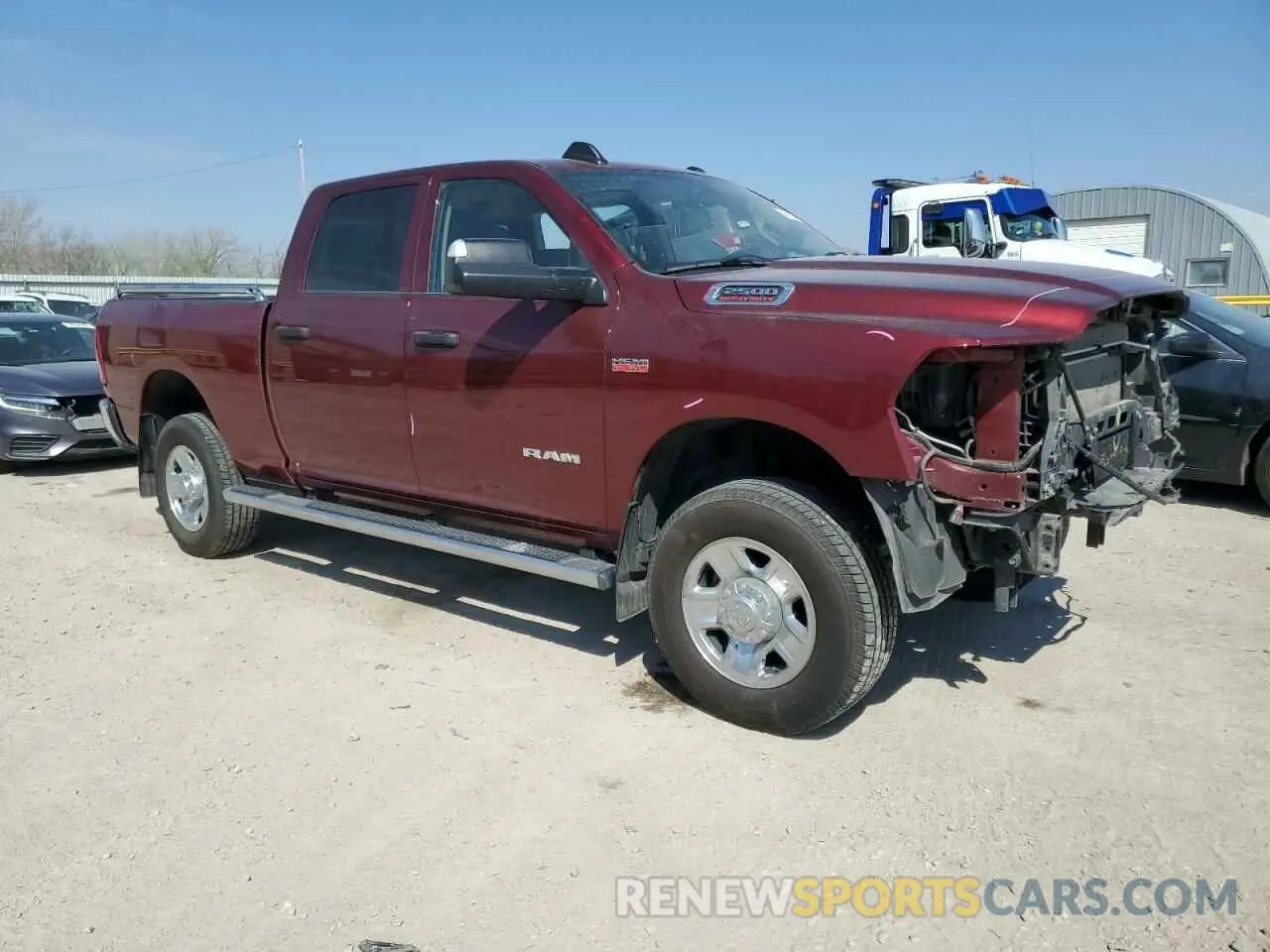 4 Photograph of a damaged car 3C6UR5CJXLG285239 RAM 2500 2020