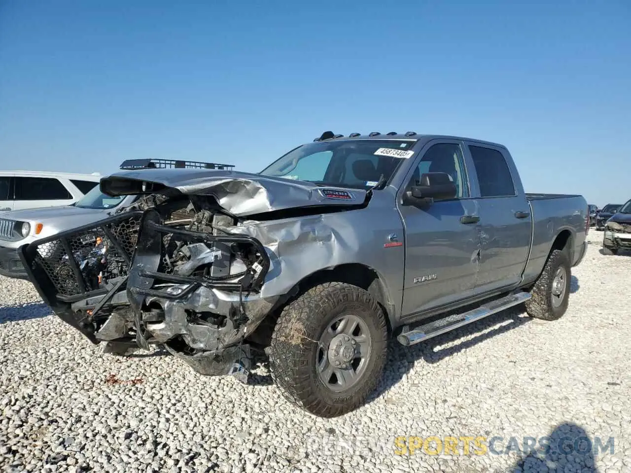 1 Photograph of a damaged car 3C6UR5CL0LG178492 RAM 2500 2020