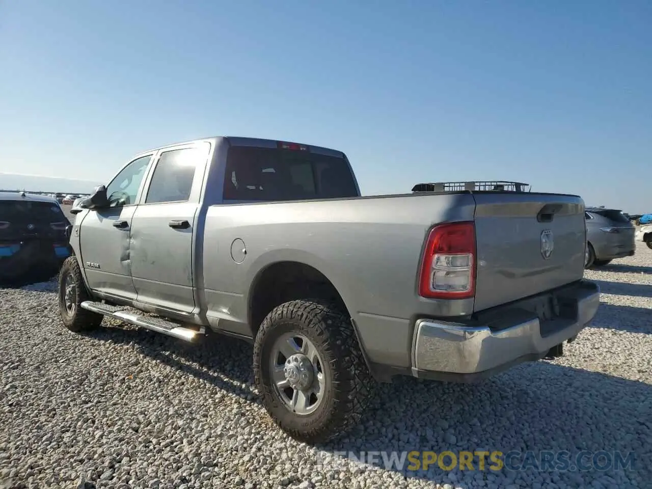 2 Photograph of a damaged car 3C6UR5CL0LG178492 RAM 2500 2020