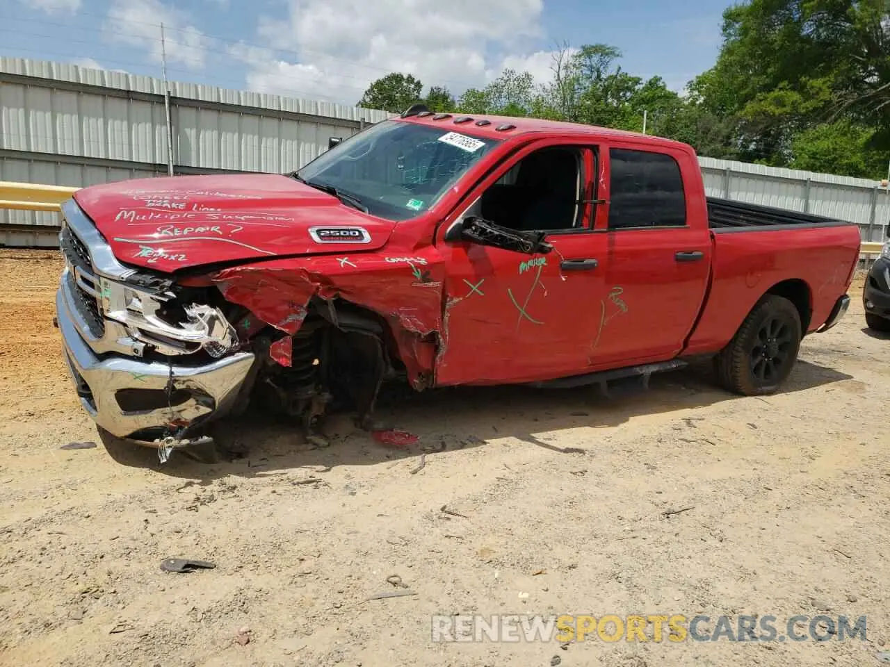 1 Photograph of a damaged car 3C6UR5CL0LG303331 RAM 2500 2020