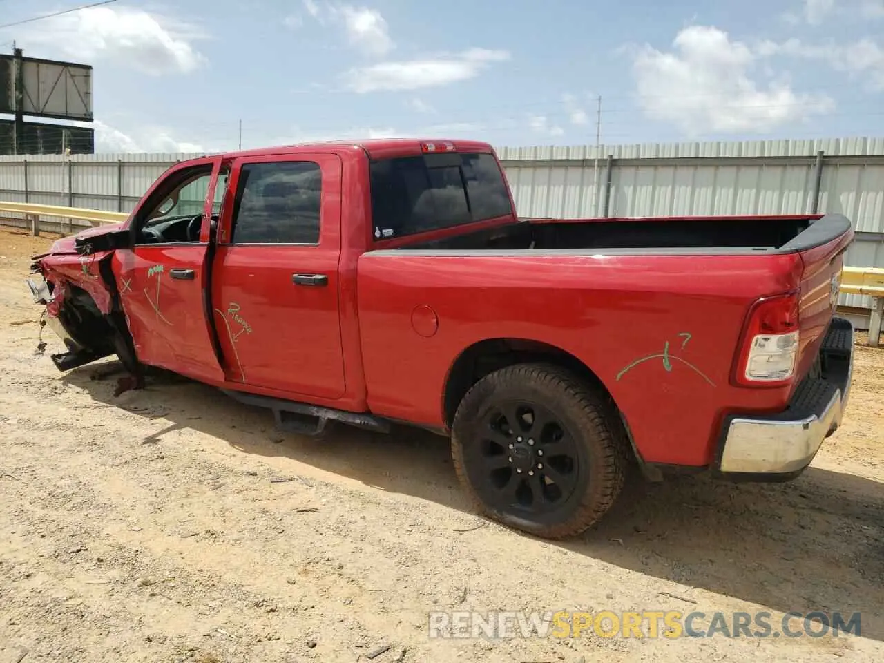 2 Photograph of a damaged car 3C6UR5CL0LG303331 RAM 2500 2020