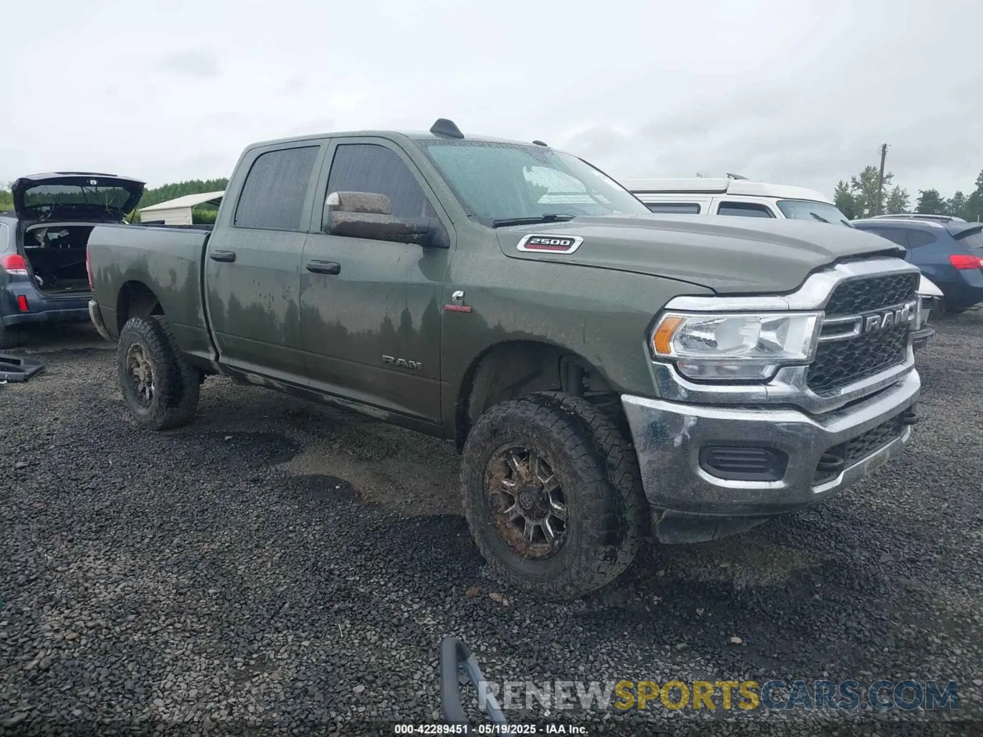 1 Photograph of a damaged car 3C6UR5CL1LG308828 RAM 2500 2020