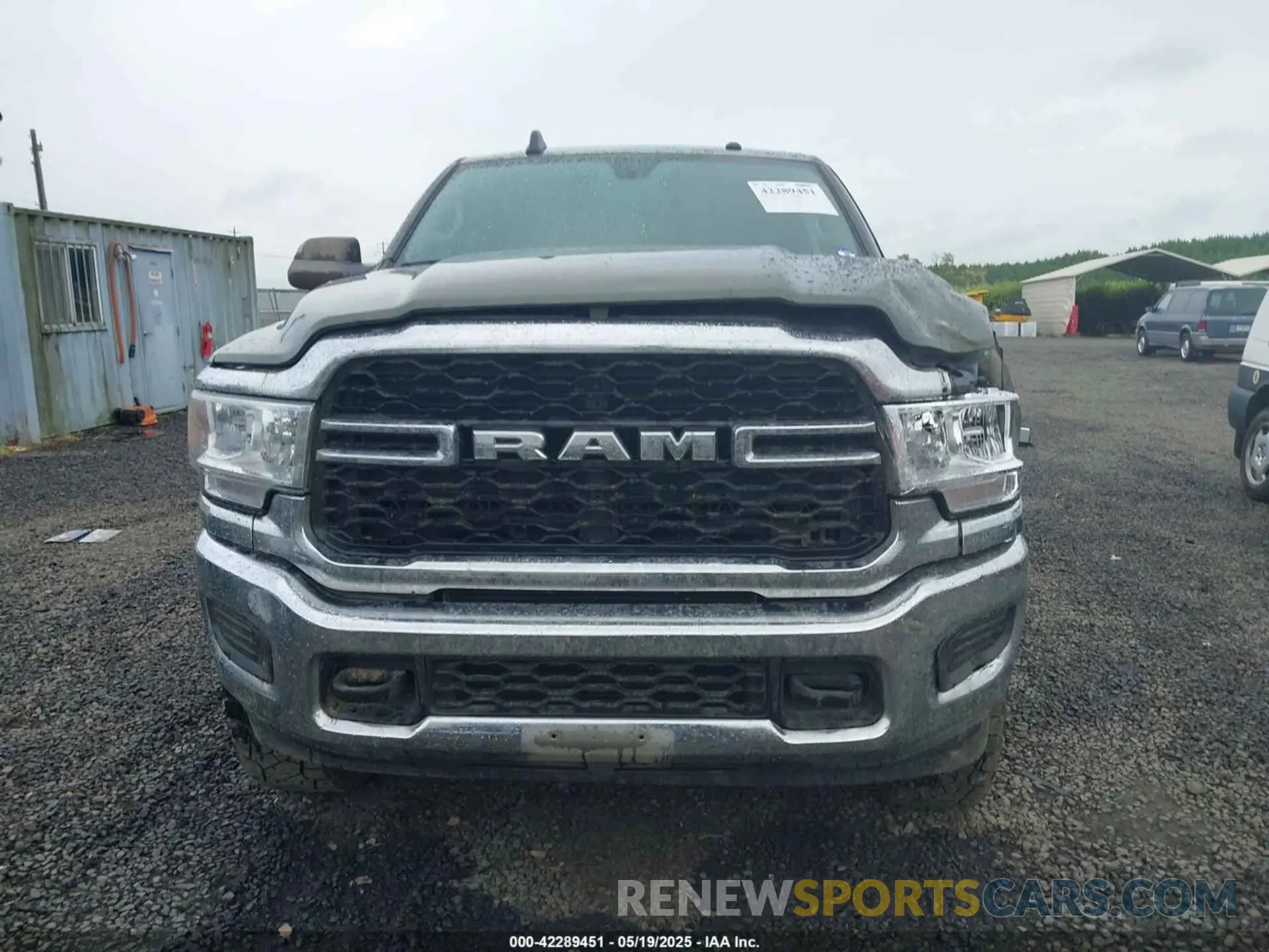 13 Photograph of a damaged car 3C6UR5CL1LG308828 RAM 2500 2020