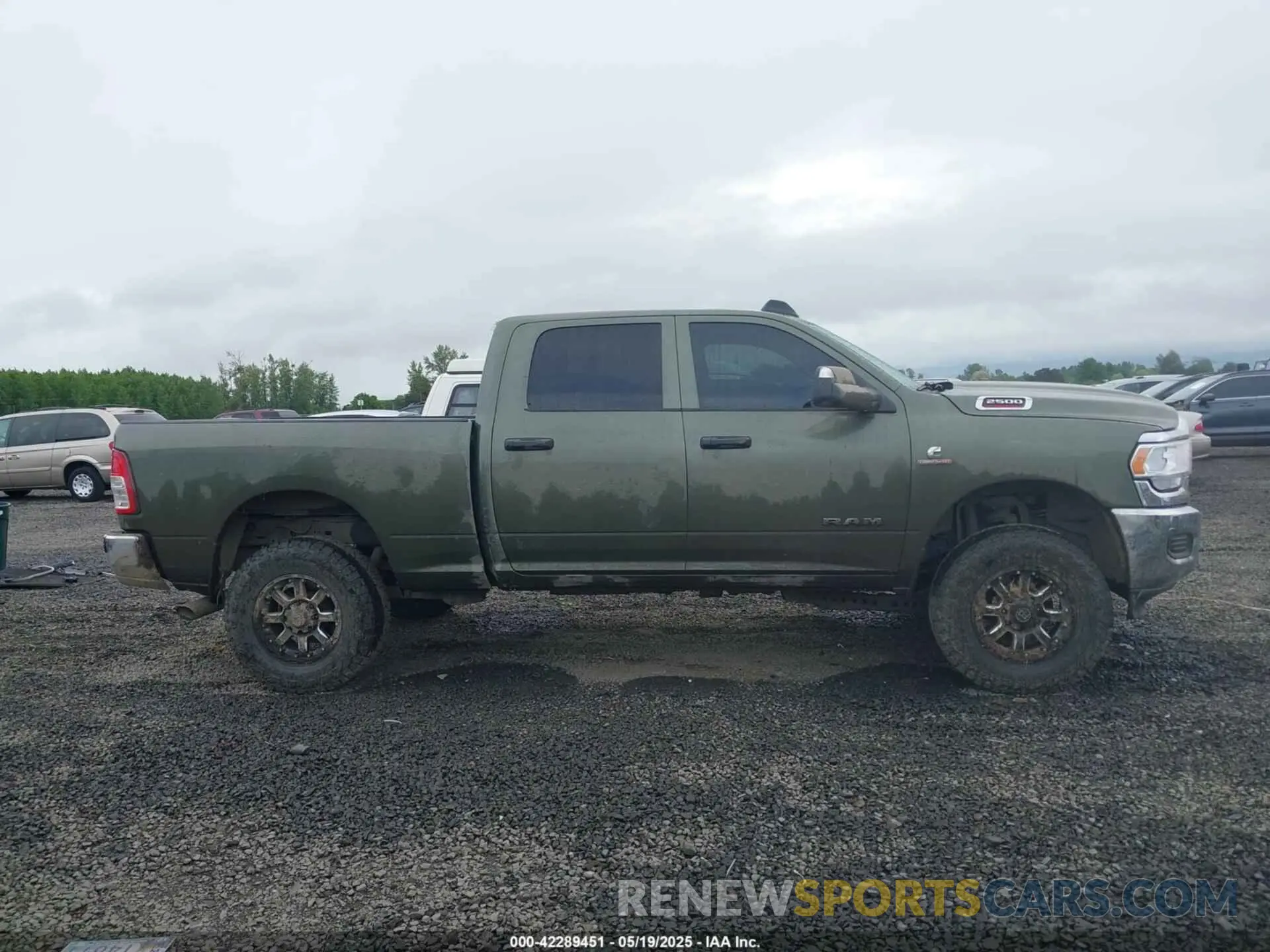 14 Photograph of a damaged car 3C6UR5CL1LG308828 RAM 2500 2020