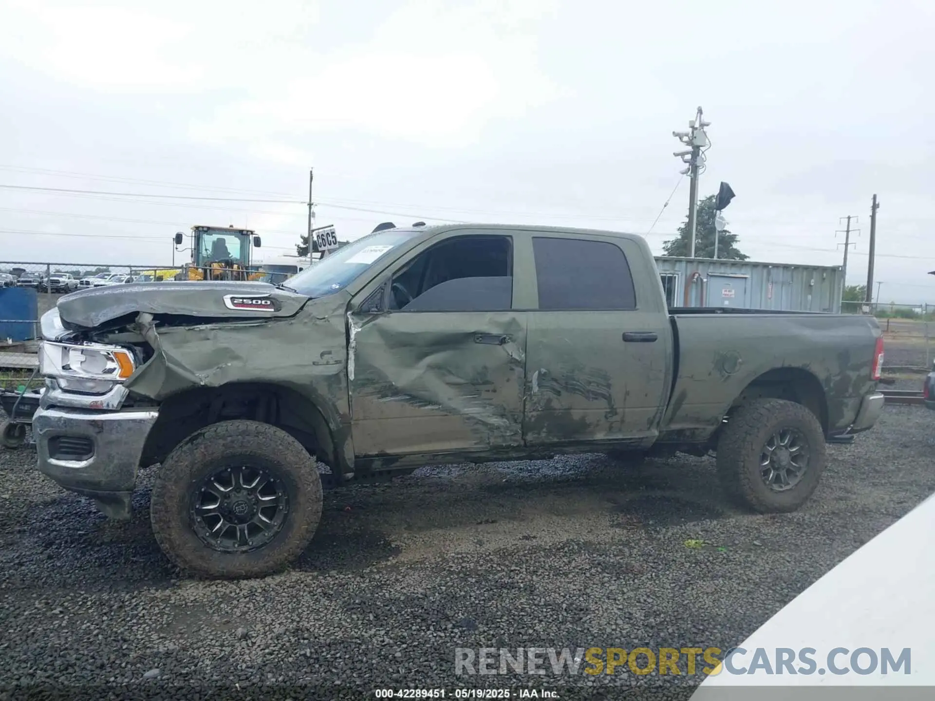 15 Photograph of a damaged car 3C6UR5CL1LG308828 RAM 2500 2020