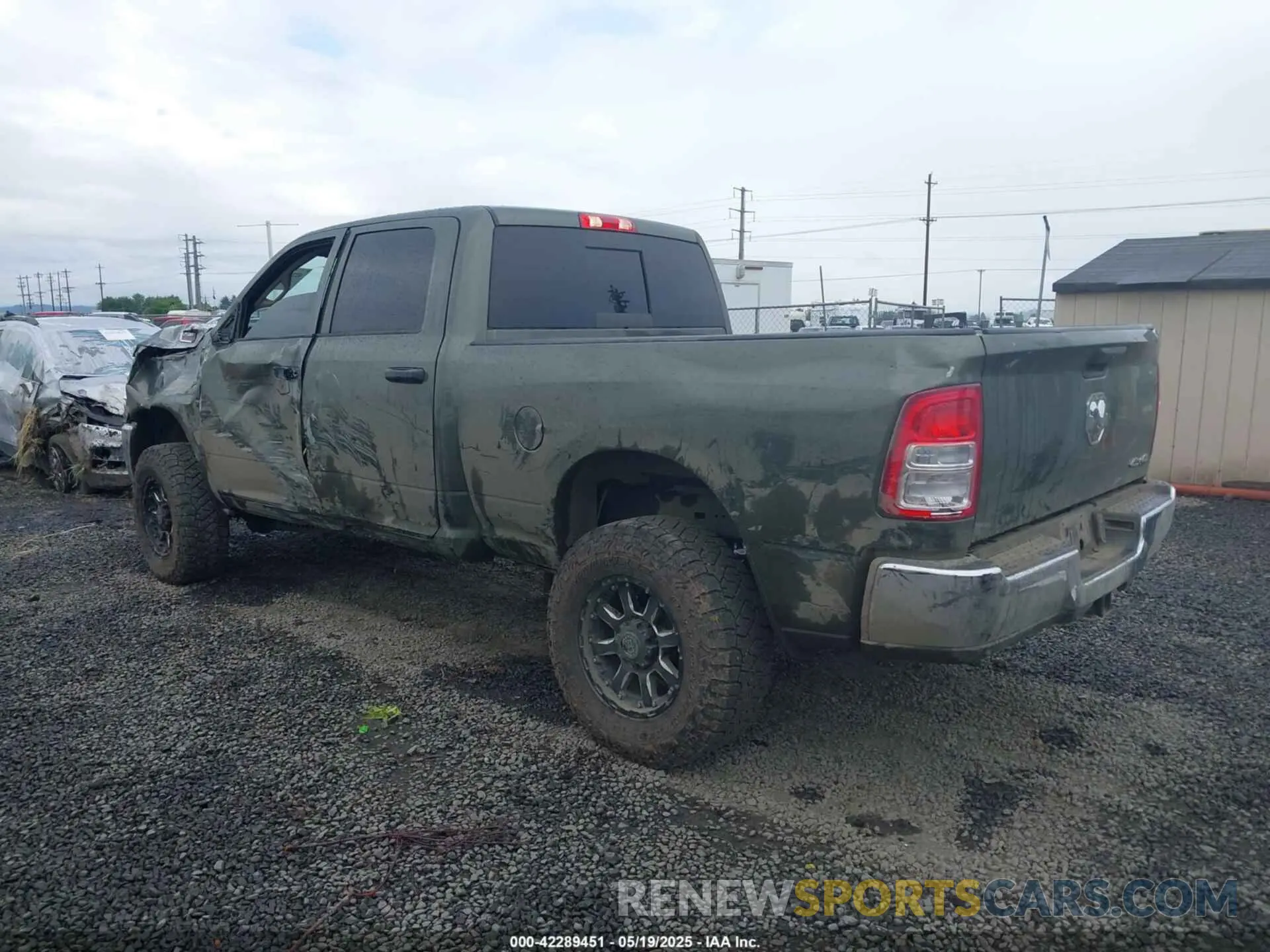 3 Photograph of a damaged car 3C6UR5CL1LG308828 RAM 2500 2020