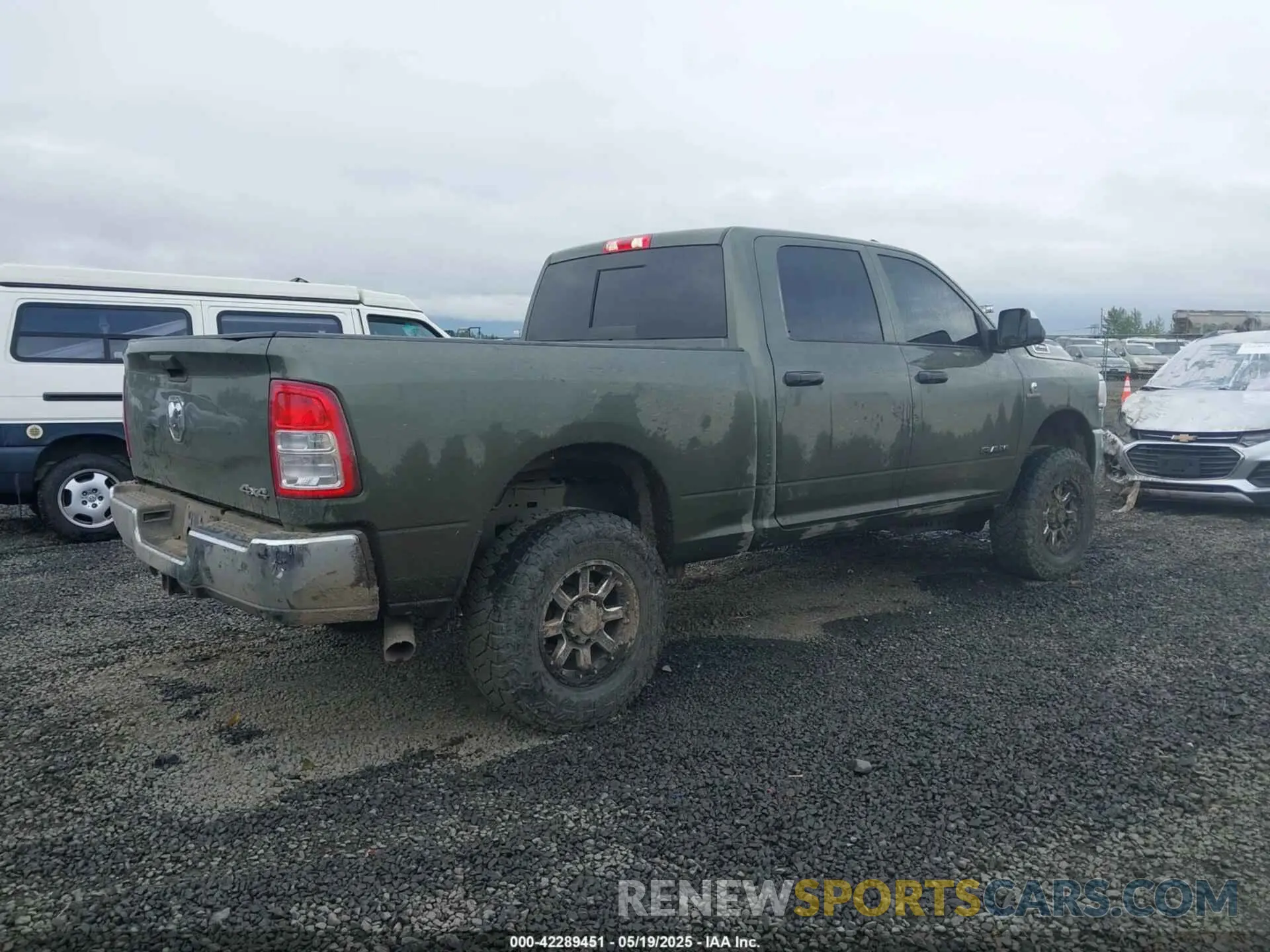 4 Photograph of a damaged car 3C6UR5CL1LG308828 RAM 2500 2020