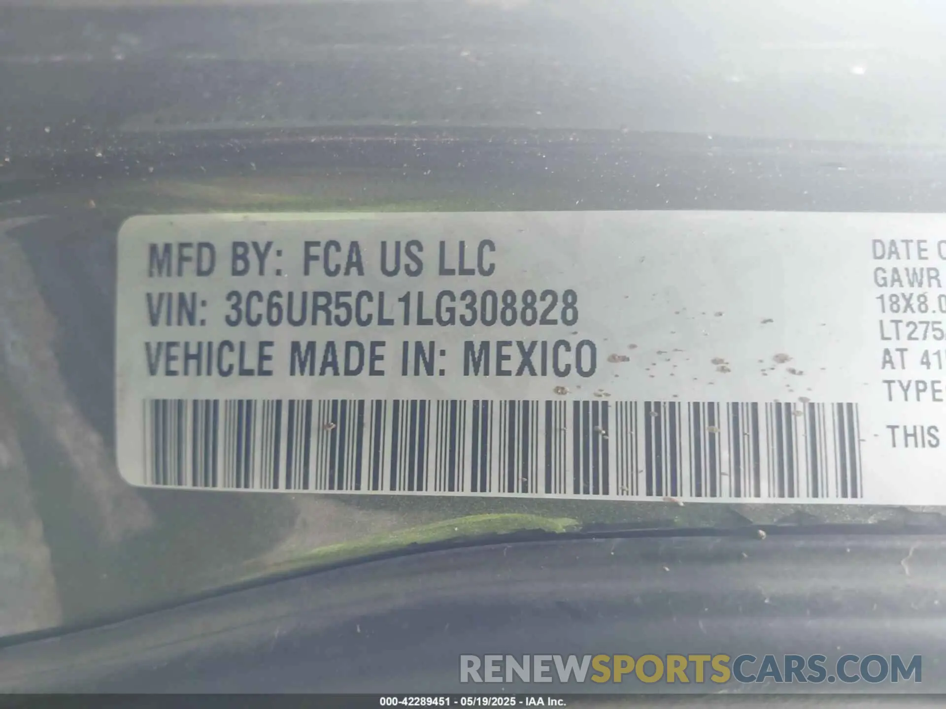 9 Photograph of a damaged car 3C6UR5CL1LG308828 RAM 2500 2020