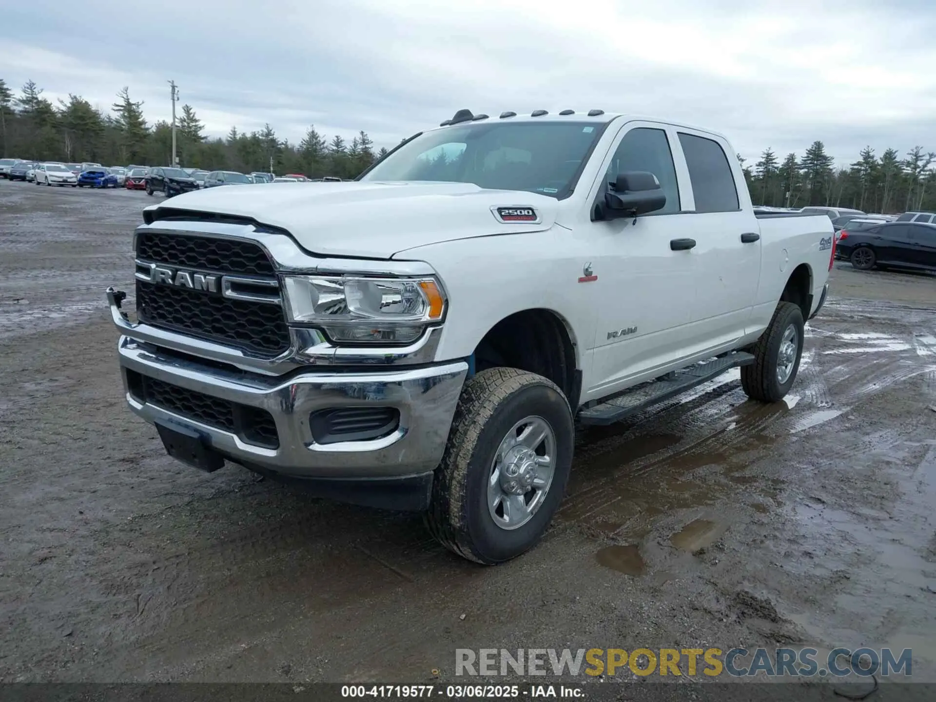 2 Photograph of a damaged car 3C6UR5CL2LG101378 RAM 2500 2020