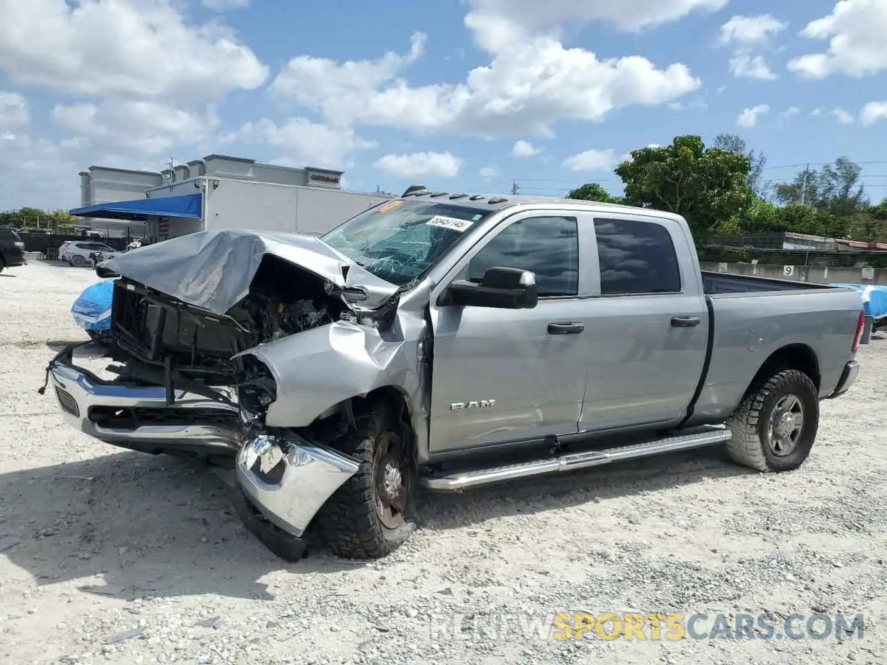 1 Photograph of a damaged car 3C6UR5CL2LG276181 RAM 2500 2020