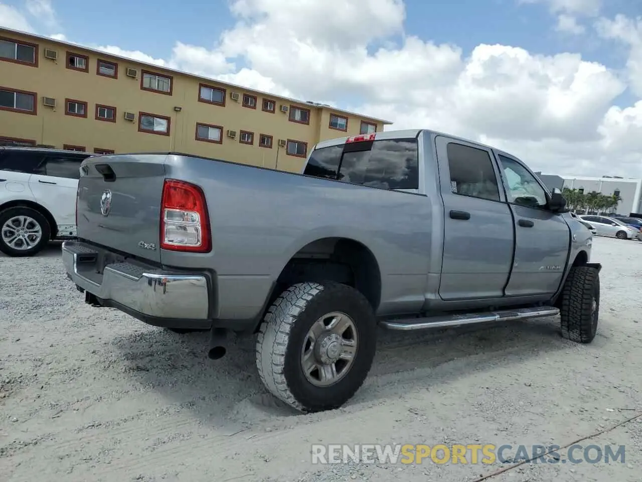 3 Photograph of a damaged car 3C6UR5CL2LG276181 RAM 2500 2020