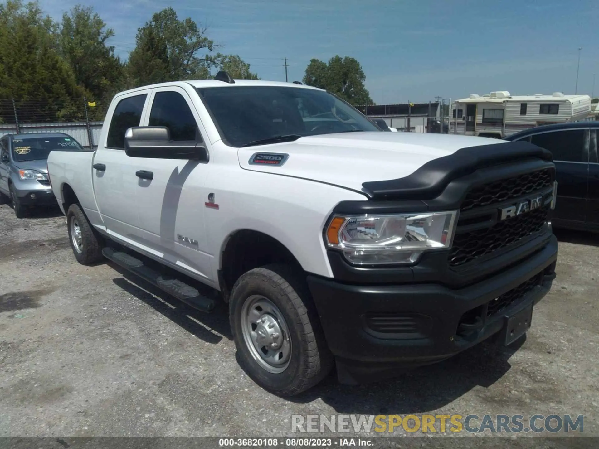1 Photograph of a damaged car 3C6UR5CL3LG100837 RAM 2500 2020