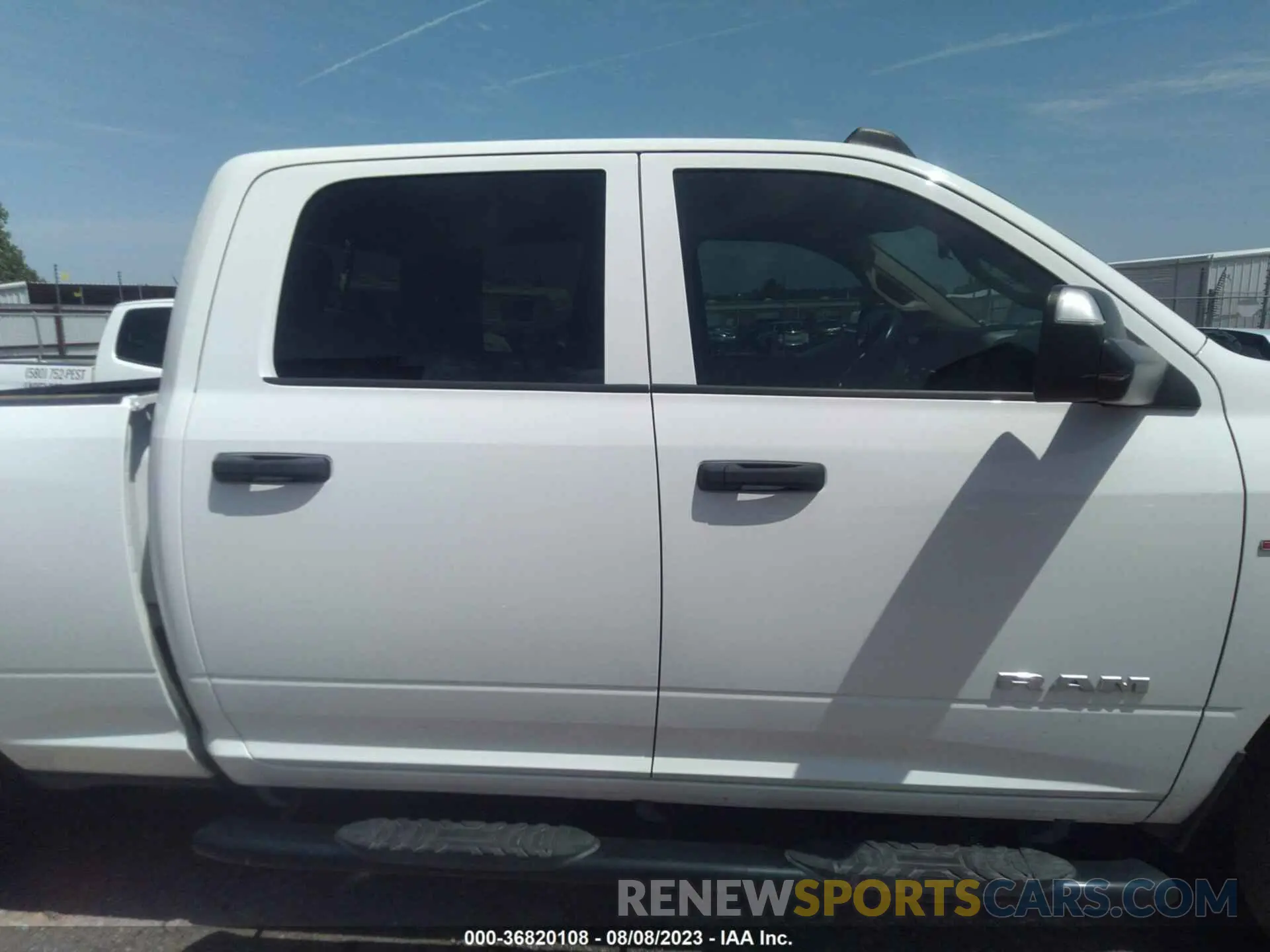 13 Photograph of a damaged car 3C6UR5CL3LG100837 RAM 2500 2020