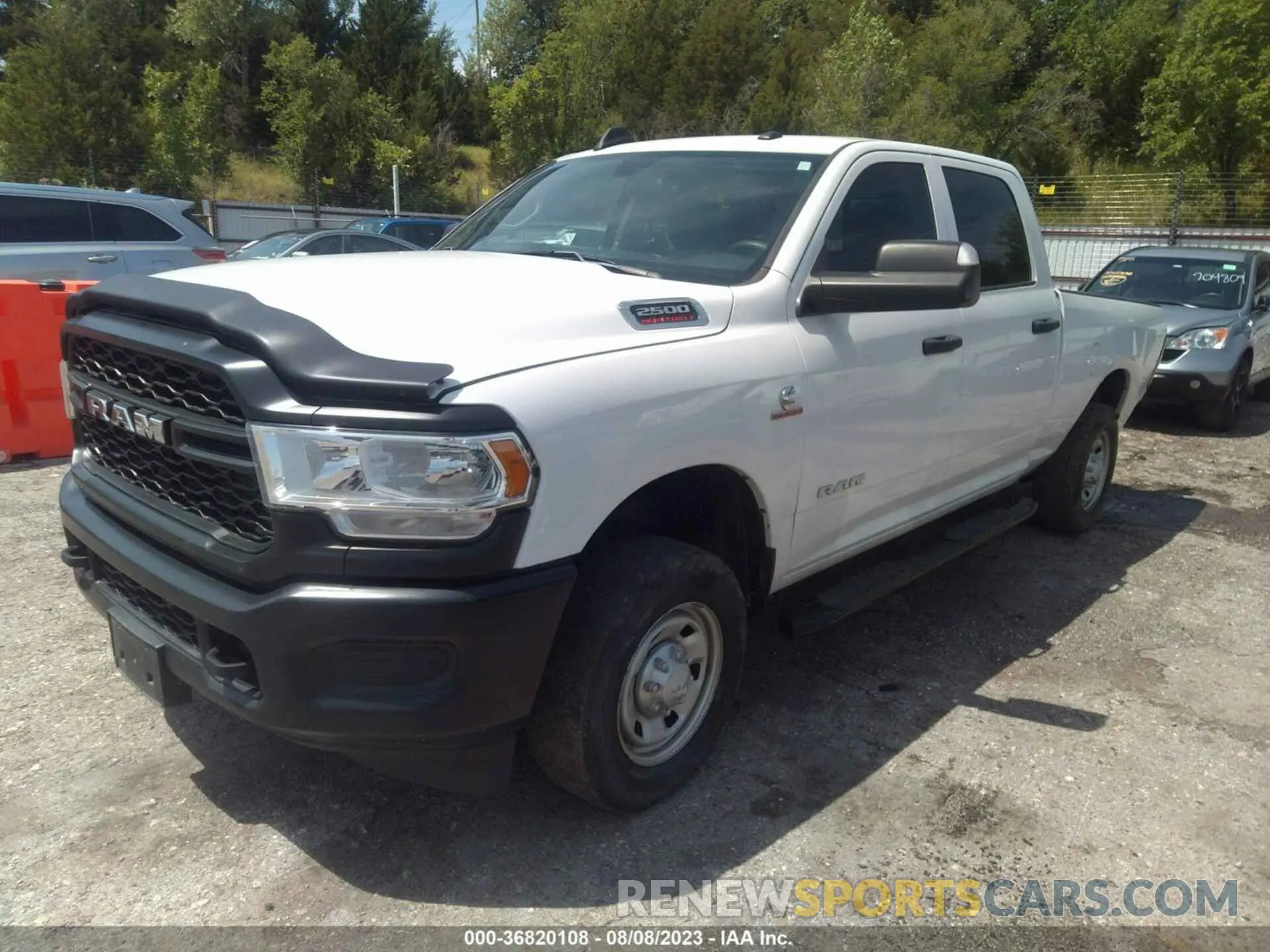 2 Photograph of a damaged car 3C6UR5CL3LG100837 RAM 2500 2020