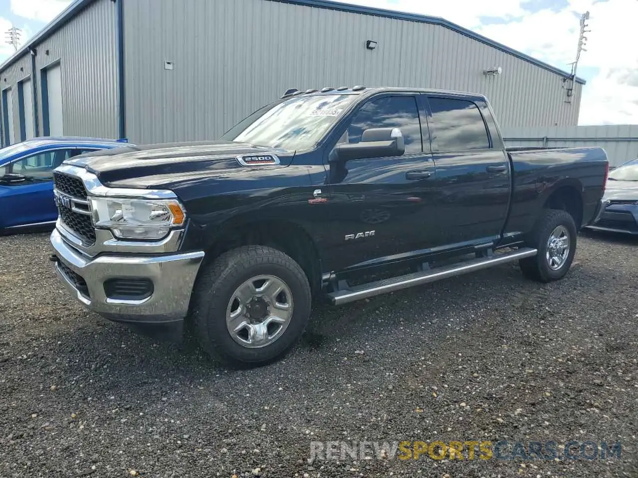 1 Photograph of a damaged car 3C6UR5CL3LG124149 RAM 2500 2020