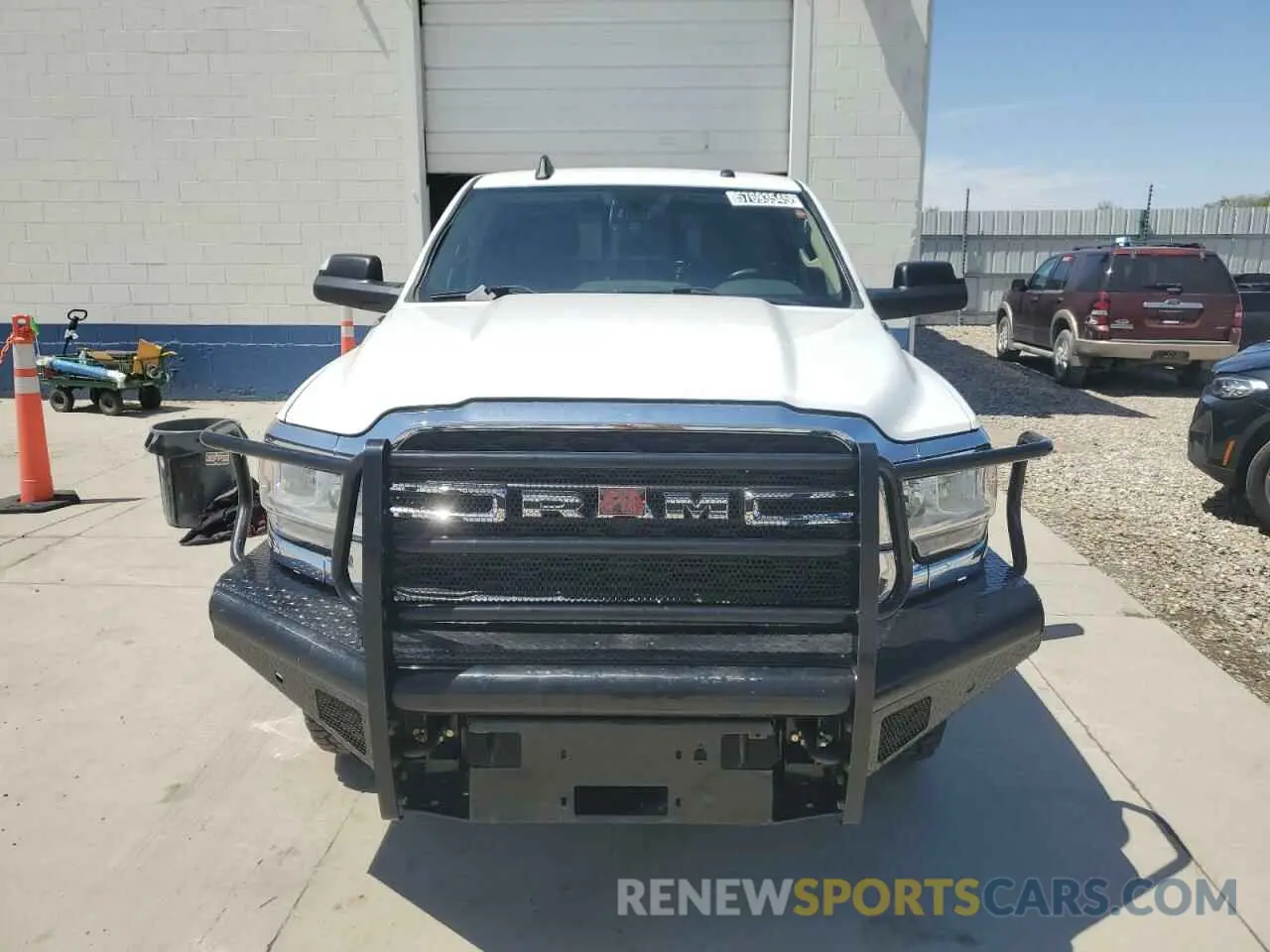 5 Photograph of a damaged car 3C6UR5CL3LG285715 RAM 2500 2020