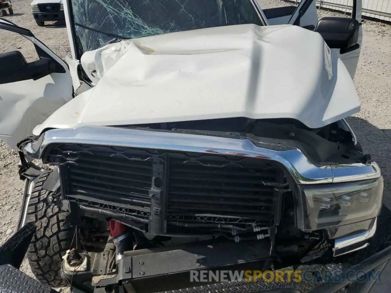 11 Photograph of a damaged car 3C6UR5CL6LG245662 RAM 2500 2020