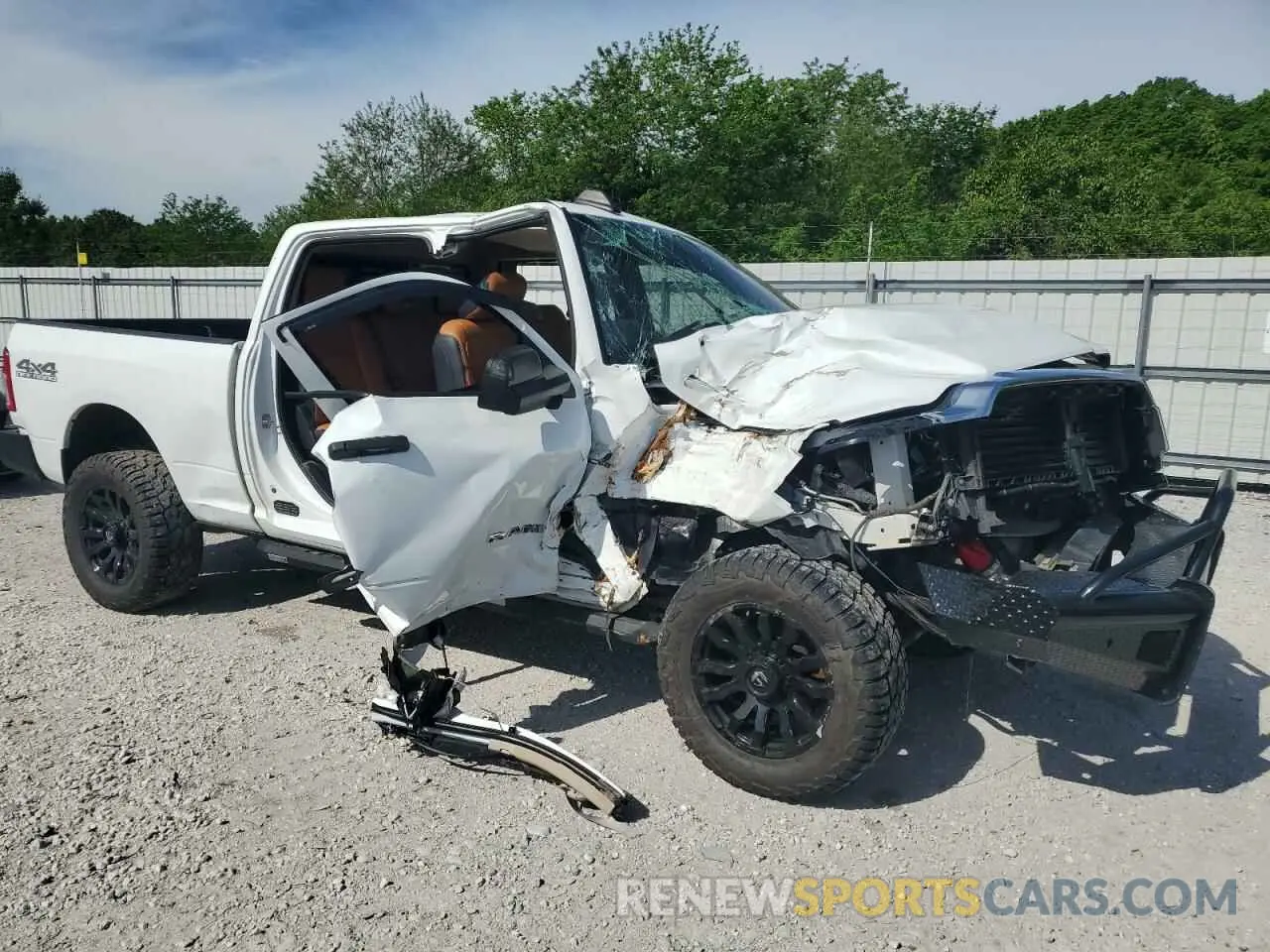 4 Photograph of a damaged car 3C6UR5CL6LG245662 RAM 2500 2020