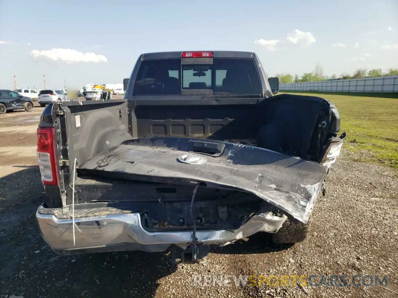 6 Photograph of a damaged car 3C6UR5CL7LG280954 RAM 2500 2020