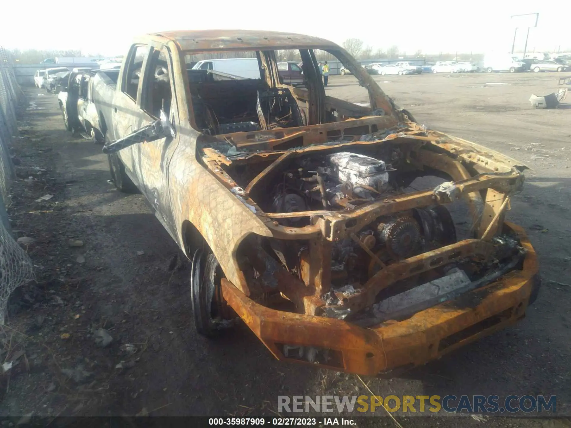 1 Photograph of a damaged car 3C6UR5CL7LG284387 RAM 2500 2020