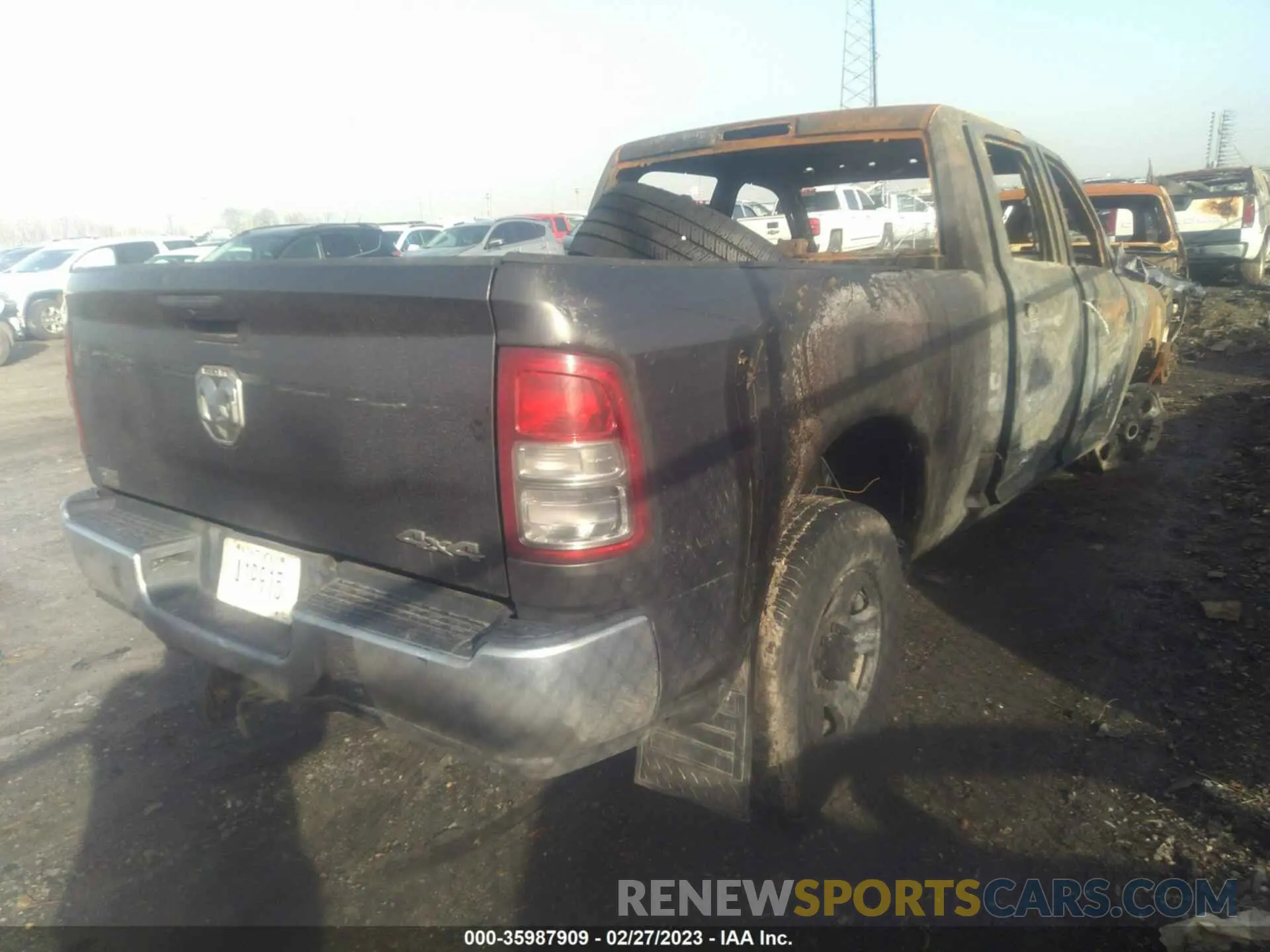 4 Photograph of a damaged car 3C6UR5CL7LG284387 RAM 2500 2020