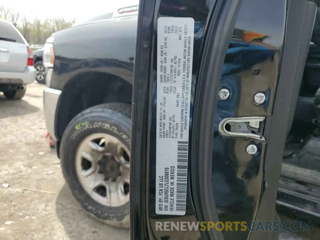 12 Photograph of a damaged car 3C6UR5CL7LG308879 RAM 2500 2020