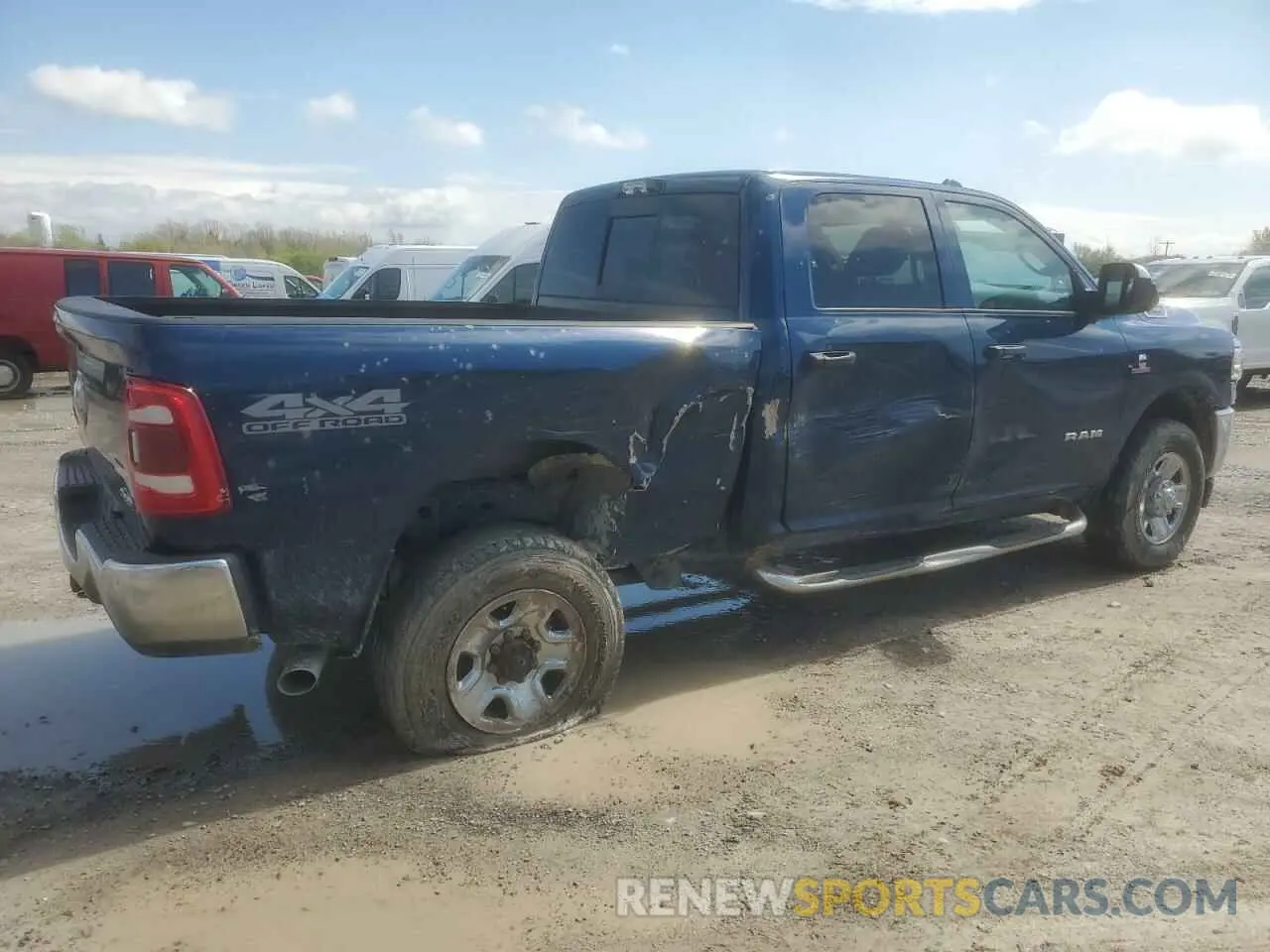 3 Photograph of a damaged car 3C6UR5CL8LG111249 RAM 2500 2020
