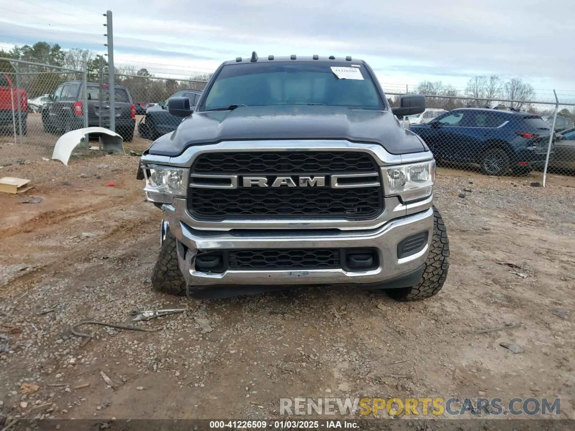 12 Photograph of a damaged car 3C6UR5CL9LG123989 RAM 2500 2020