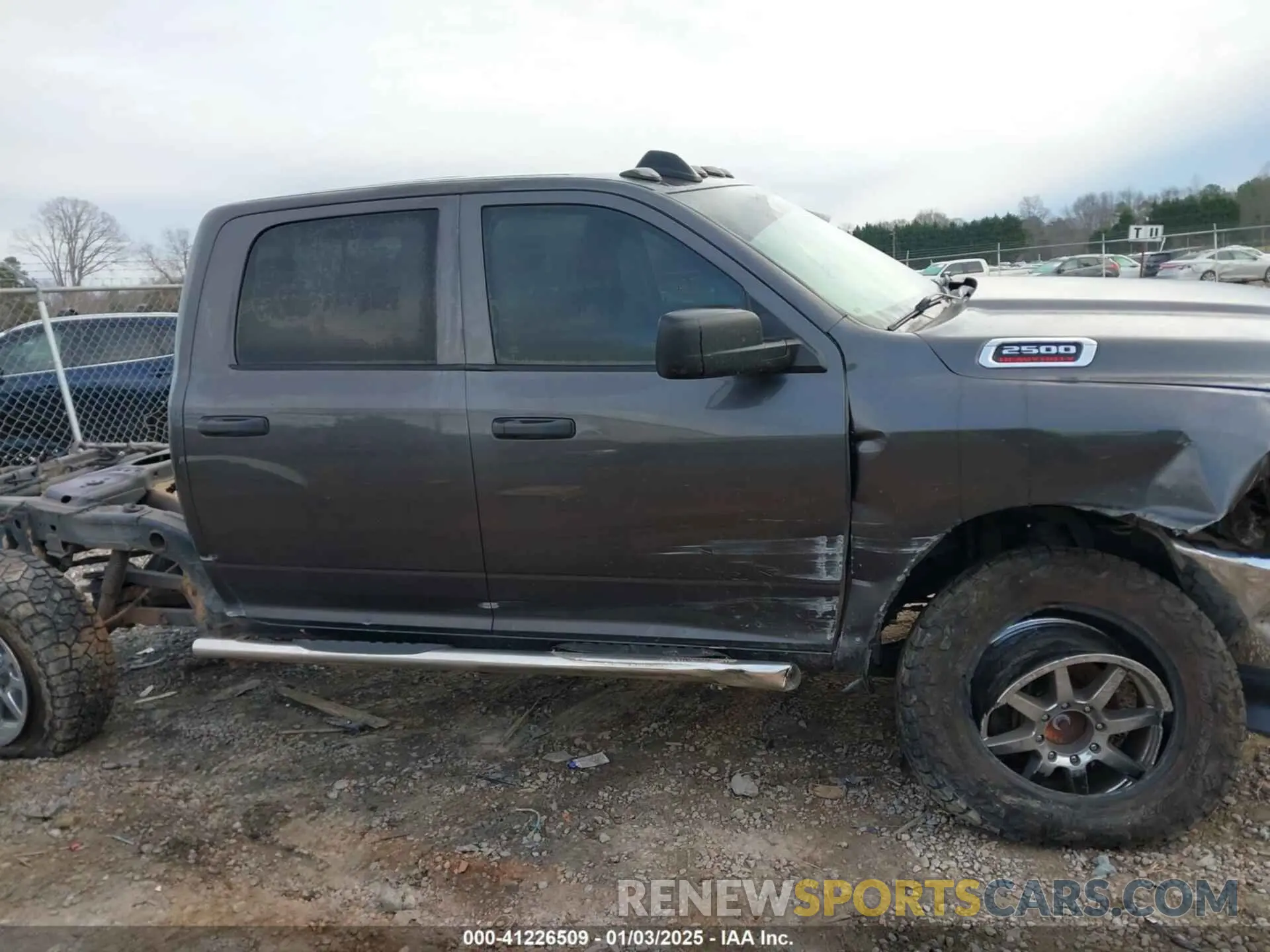 13 Photograph of a damaged car 3C6UR5CL9LG123989 RAM 2500 2020