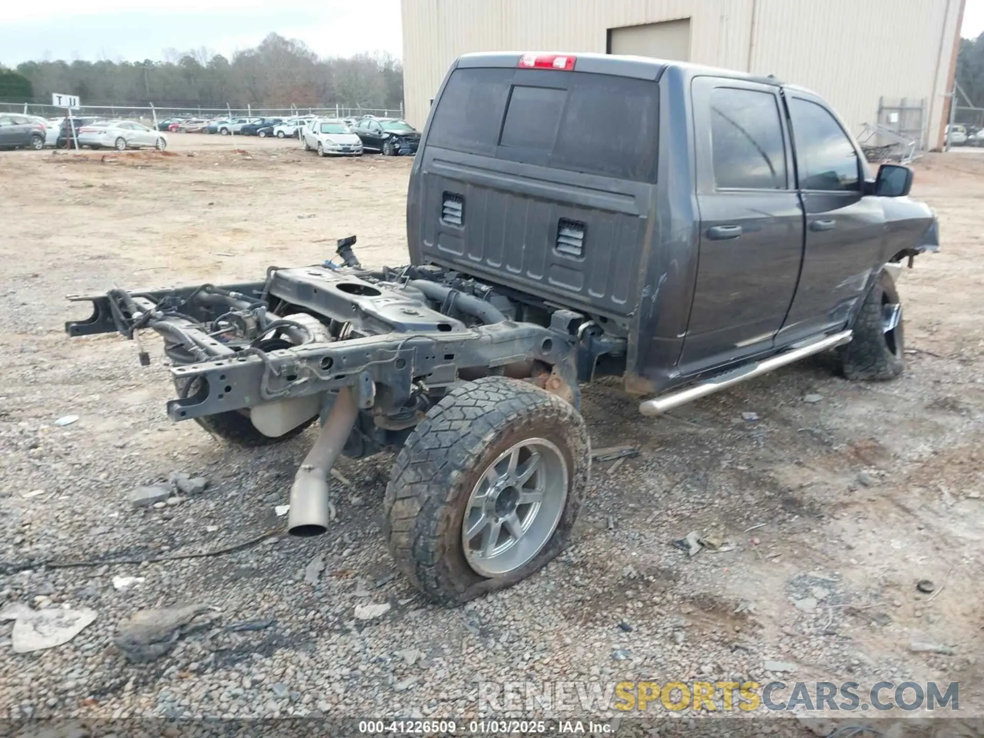 4 Photograph of a damaged car 3C6UR5CL9LG123989 RAM 2500 2020