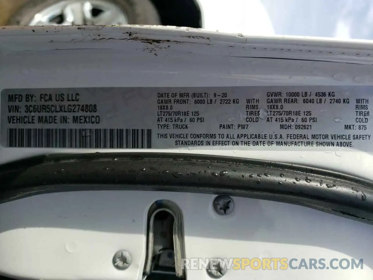 13 Photograph of a damaged car 3C6UR5CLXLG274808 RAM 2500 2020