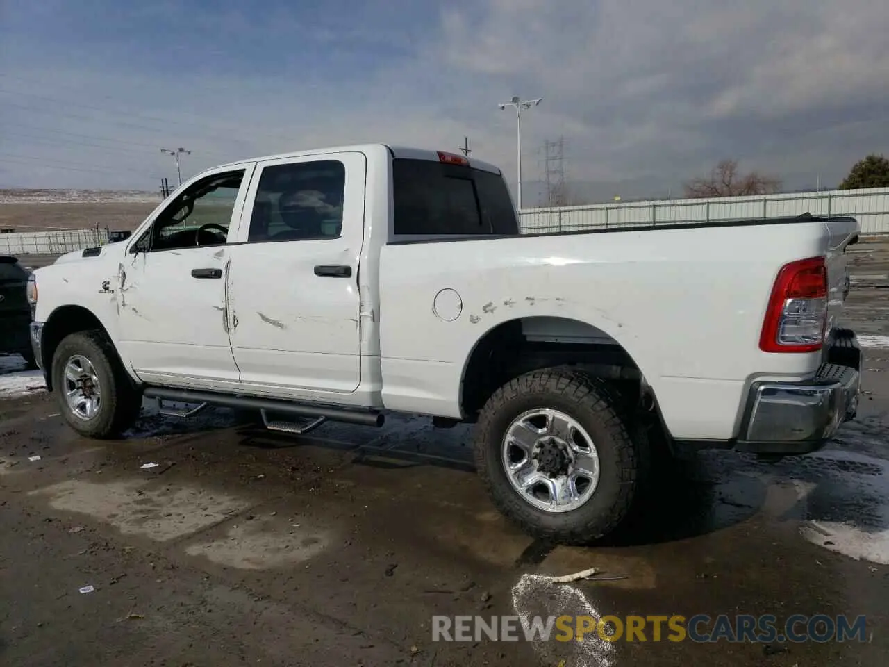 2 Photograph of a damaged car 3C6UR5CLXLG274808 RAM 2500 2020