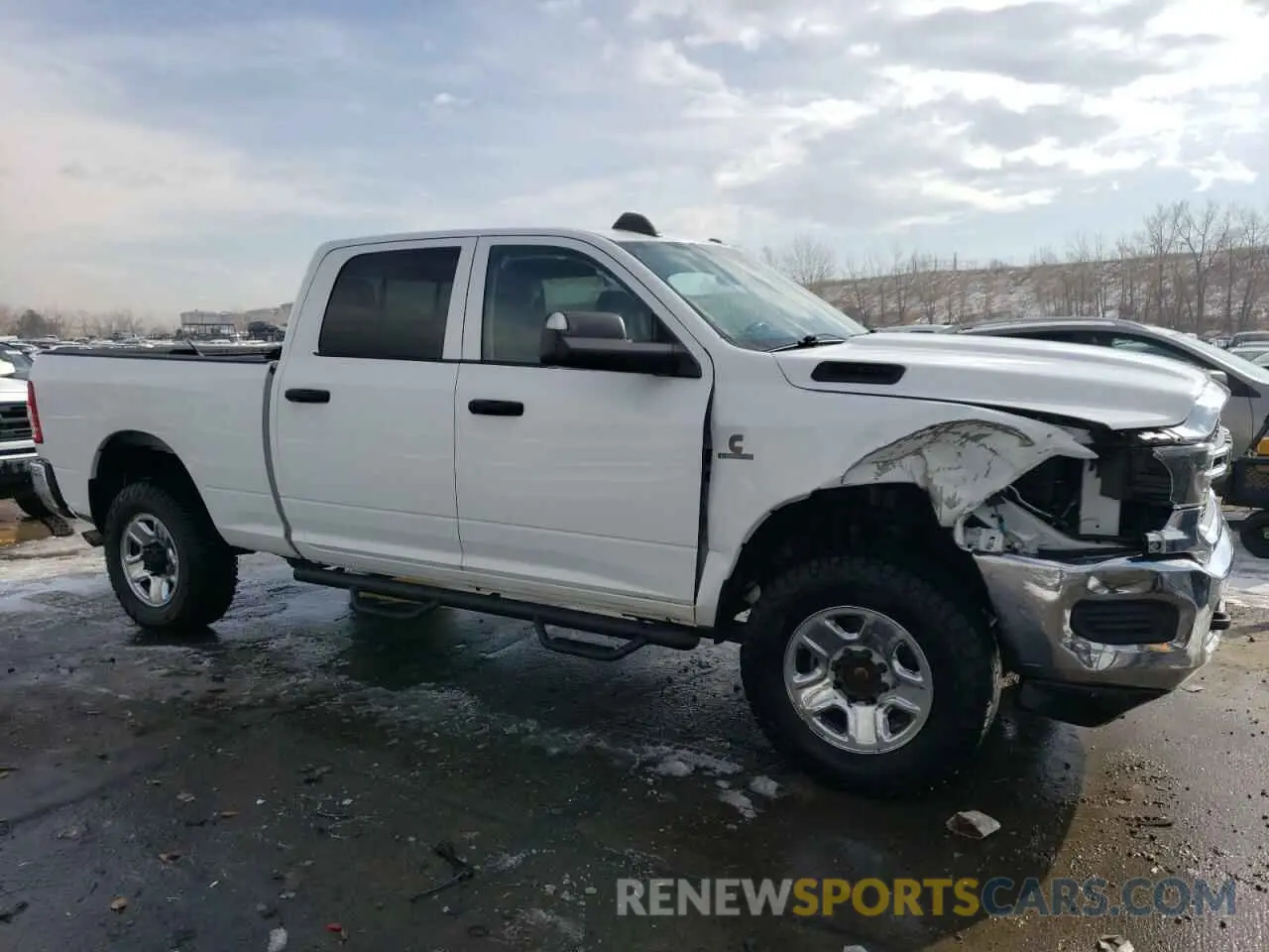 4 Photograph of a damaged car 3C6UR5CLXLG274808 RAM 2500 2020