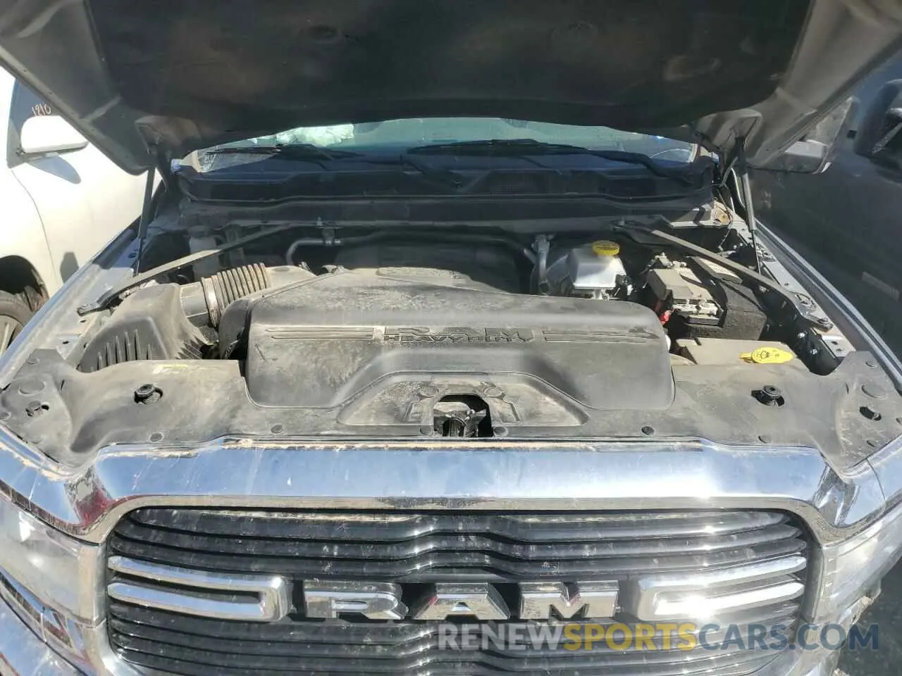 13 Photograph of a damaged car 3C6UR5DJ2LG297531 RAM 2500 2020