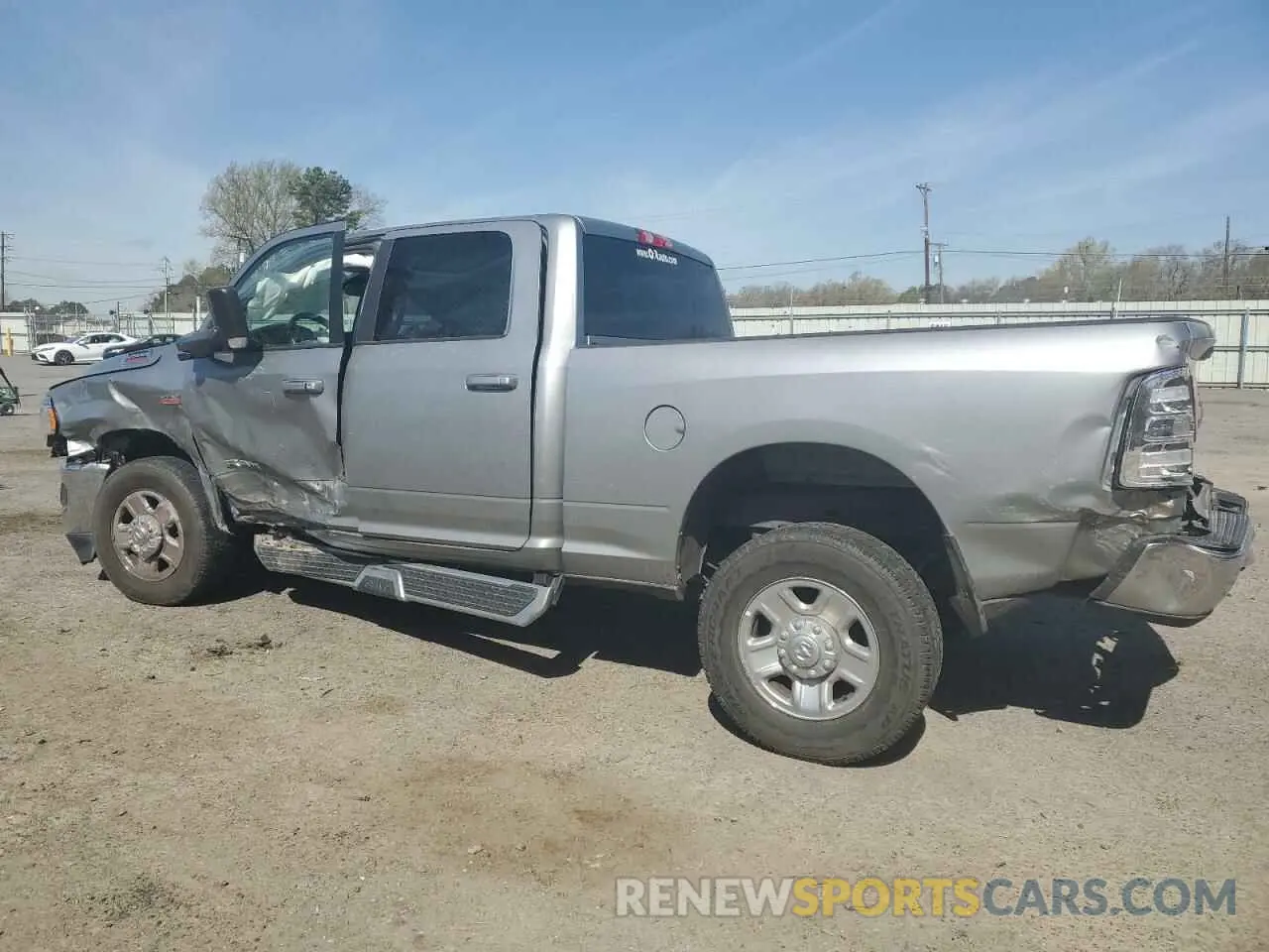 2 Photograph of a damaged car 3C6UR5DJ2LG297531 RAM 2500 2020